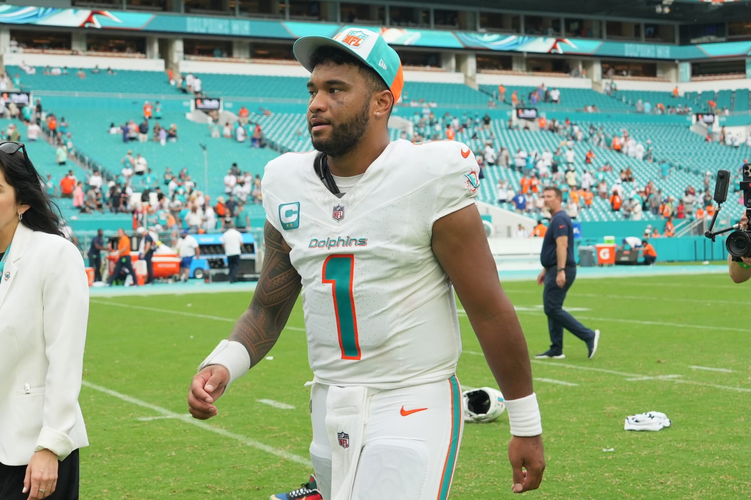 MIAMI GARDENS, FL - SEPTEMBER 24: Miami Dolphins quarterback Tua Tagovailoa (1) leaves the field following the game between the Denver Broncos and the Miami Dolphins on Sunday, September 24, 2023 at Hard Rock Stadium, Miami, Fla. (Photo by Peter Joneleit/Icon Sportswire via Getty Images)