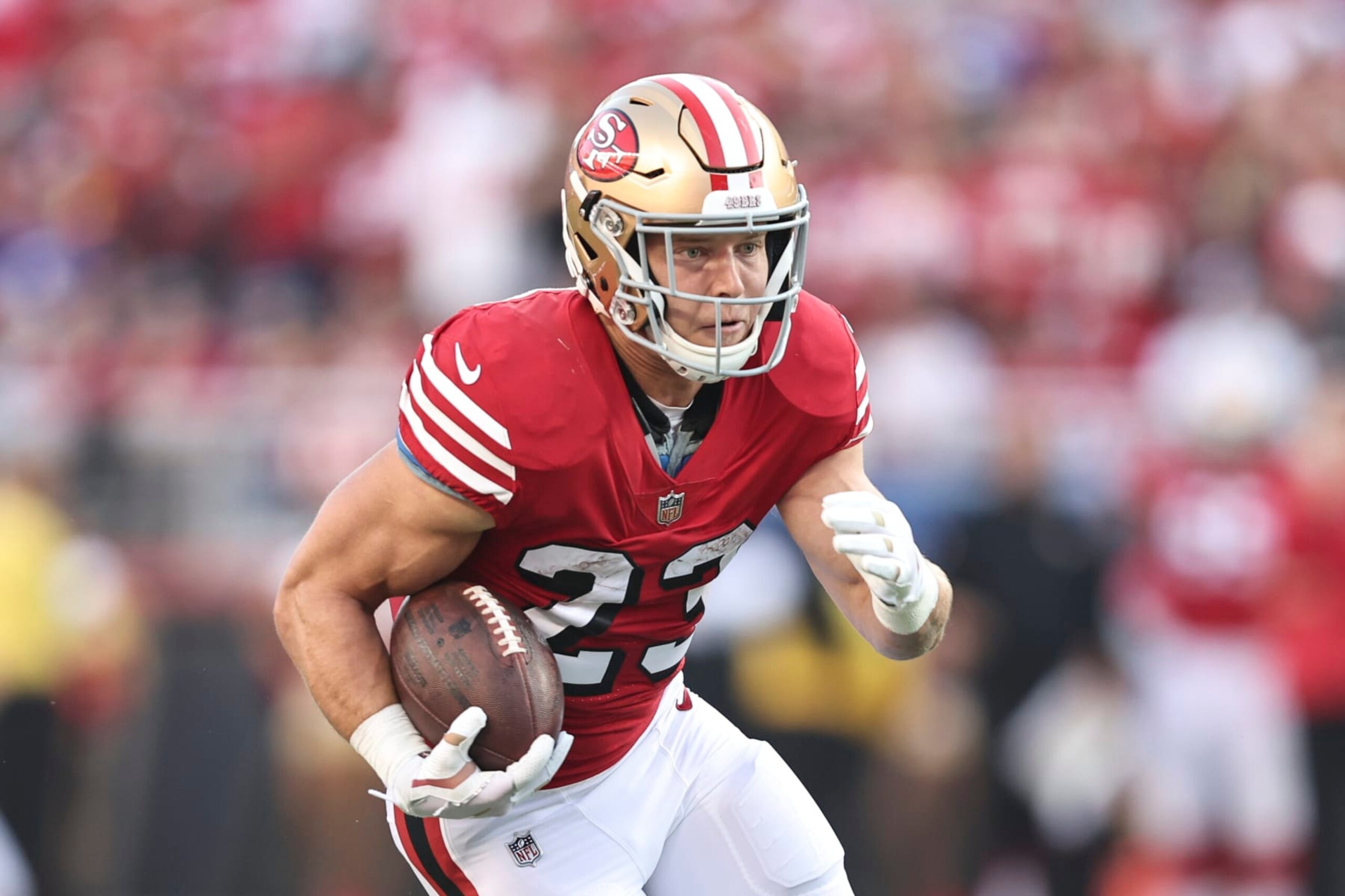 SANTA CLARA, CALIFORNIA - SEPTEMBER 21: Christian McCaffrey #23 of the San Francisco 49ers runs with the ball during an NFL football game between the San Francisco 49ers and the New York Giants at Levi's Stadium on September 21, 2023 in Santa Clara, California. (Photo by Michael Owens/Getty Images)
