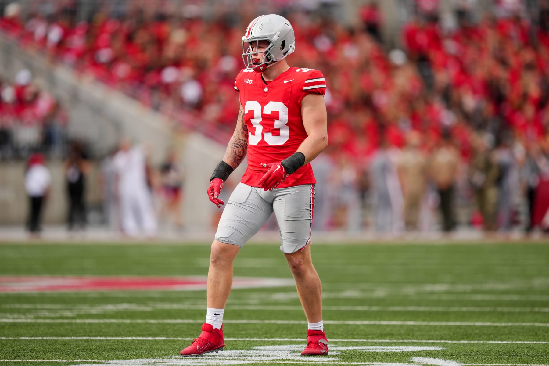 COLUMBUS, OHIO - SEPTEMBER 16: Jack Sawyer #33 of the Ohio State Buckeyes lines up for a play in the second quarter against the Western Kentucky Hilltoppers at Ohio Stadium on September 16, 2023 in Columbus, Ohio. (Photo by Dylan Buell/Getty Images)