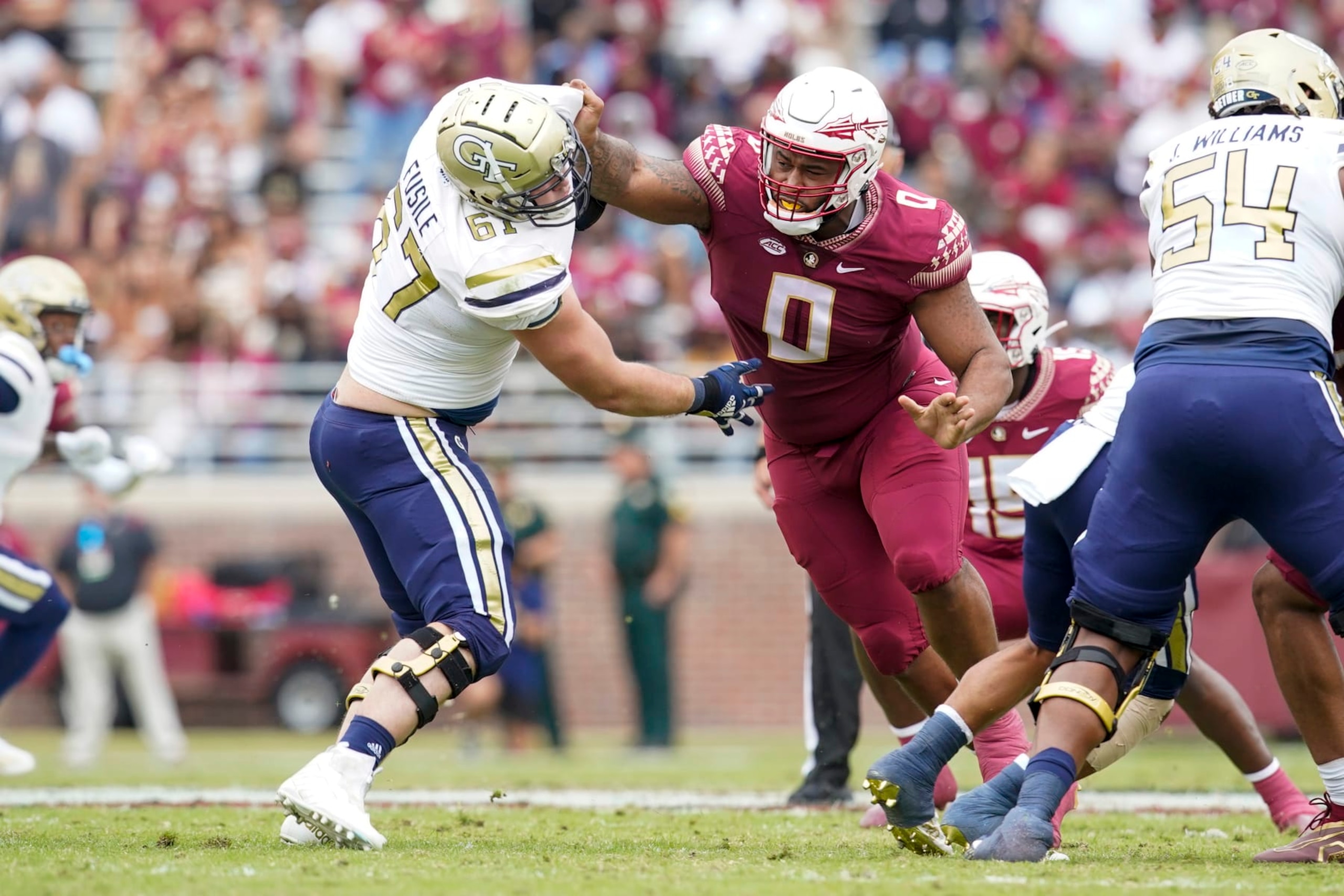 TALLAHASSEE, FL - OCTOBER 29: Florida State Seminoles defensive tackle Fabien Lovett (0) sets the line of scrimmage during a college football game against the Georgia Tech Yellow Jackets on October 29, 2022 at Doak Campbell Stadium in Tallahassee, FL. (Photo by Chris Leduc/Icon Sportswire via Getty Images) TALLAHASSEE, FL - OCTOBER 29: Florida State Seminoles defensive tackle Fabien Lovett (0) sets the line of scrimmage during a college football game against the Georgia Tech Yellow Jackets on October 29, 2022 at Doak Campbell Stadium in Tallahassee, FL. (Photo by Chris Leduc/Icon Sportswire via Getty Images)