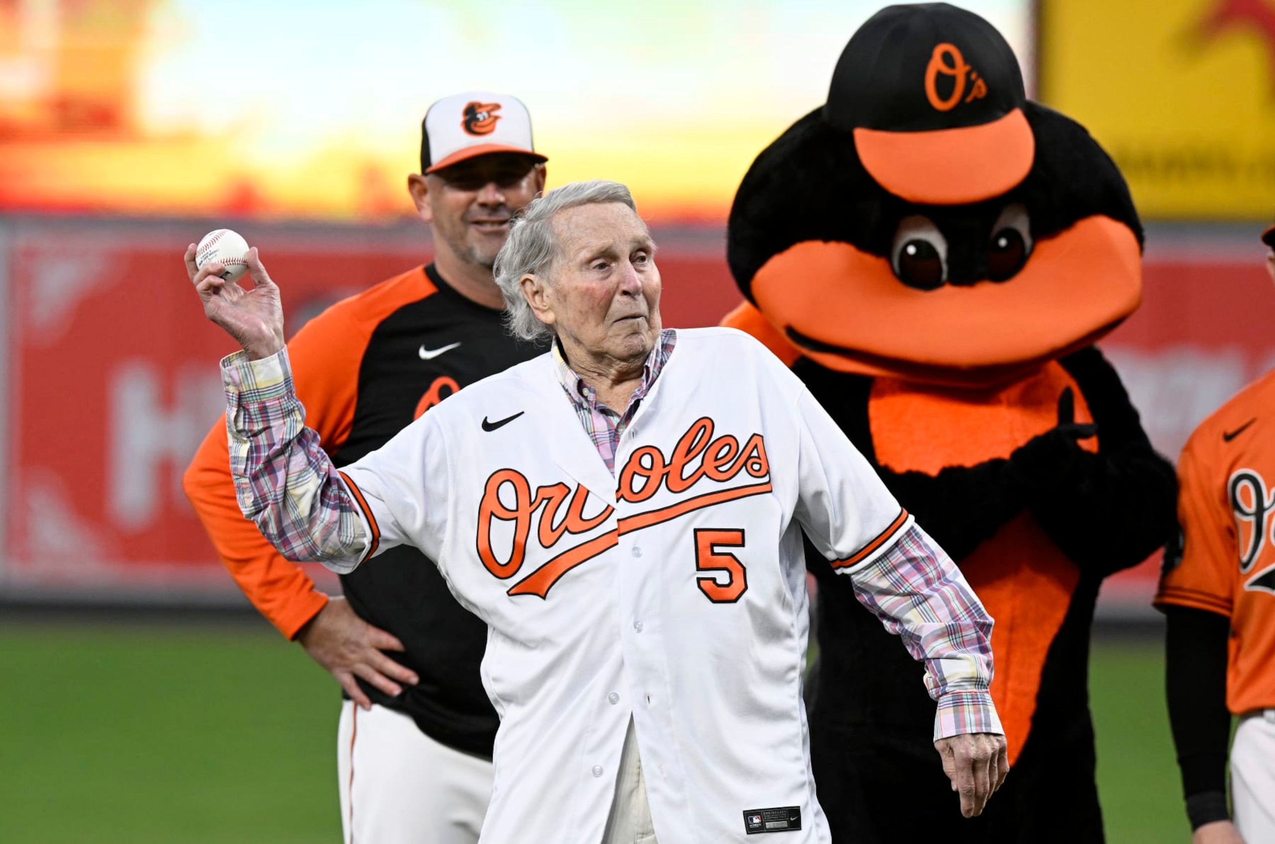 BALTIMORE, MARYLAND - SEPTEMBER 24: Former Baltimore Orioles and Hall of Famer Brooks Robinson throws out the first pitch before the game between the Baltimore Orioles and the Houston Astros  at Oriole Park at Camden Yards on September 24, 2022 in Baltimore, Maryland. (Photo by Greg Fiume/Getty Images)