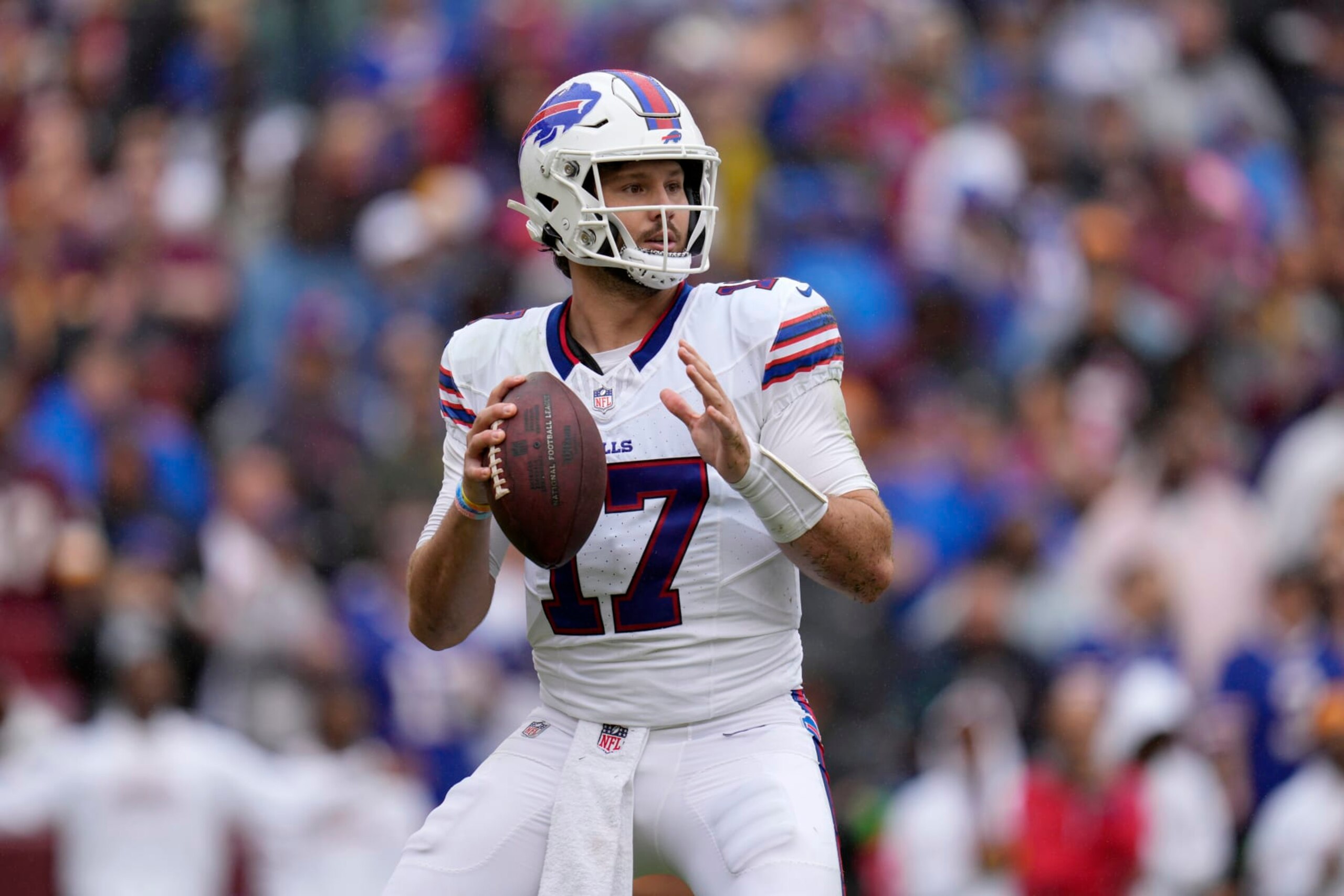 LANDOVER, MARYLAND - SEPTEMBER 24: Josh Allen #17 of the Buffalo Bills looks to pass against the Washington Commanders during the first half at FedExField on September 24, 2023 in Landover, Maryland. (Photo by Jess Rapfogel/Getty Images)