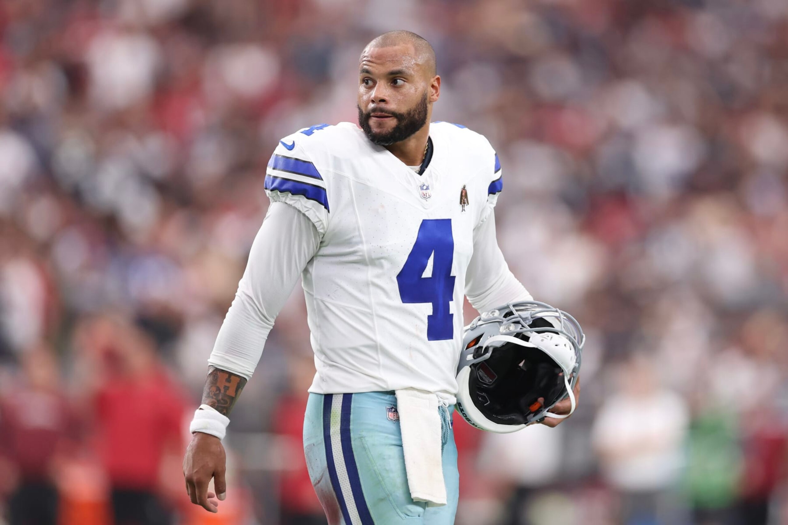 GLENDALE, ARIZONA - SEPTEMBER 24: Dak Prescott #4 of the Dallas Cowboys looks on during the second half of a game against the Arizona Cardinals at State Farm Stadium on September 24, 2023 in Glendale, Arizona. (Photo by Christian Petersen/Getty Images)