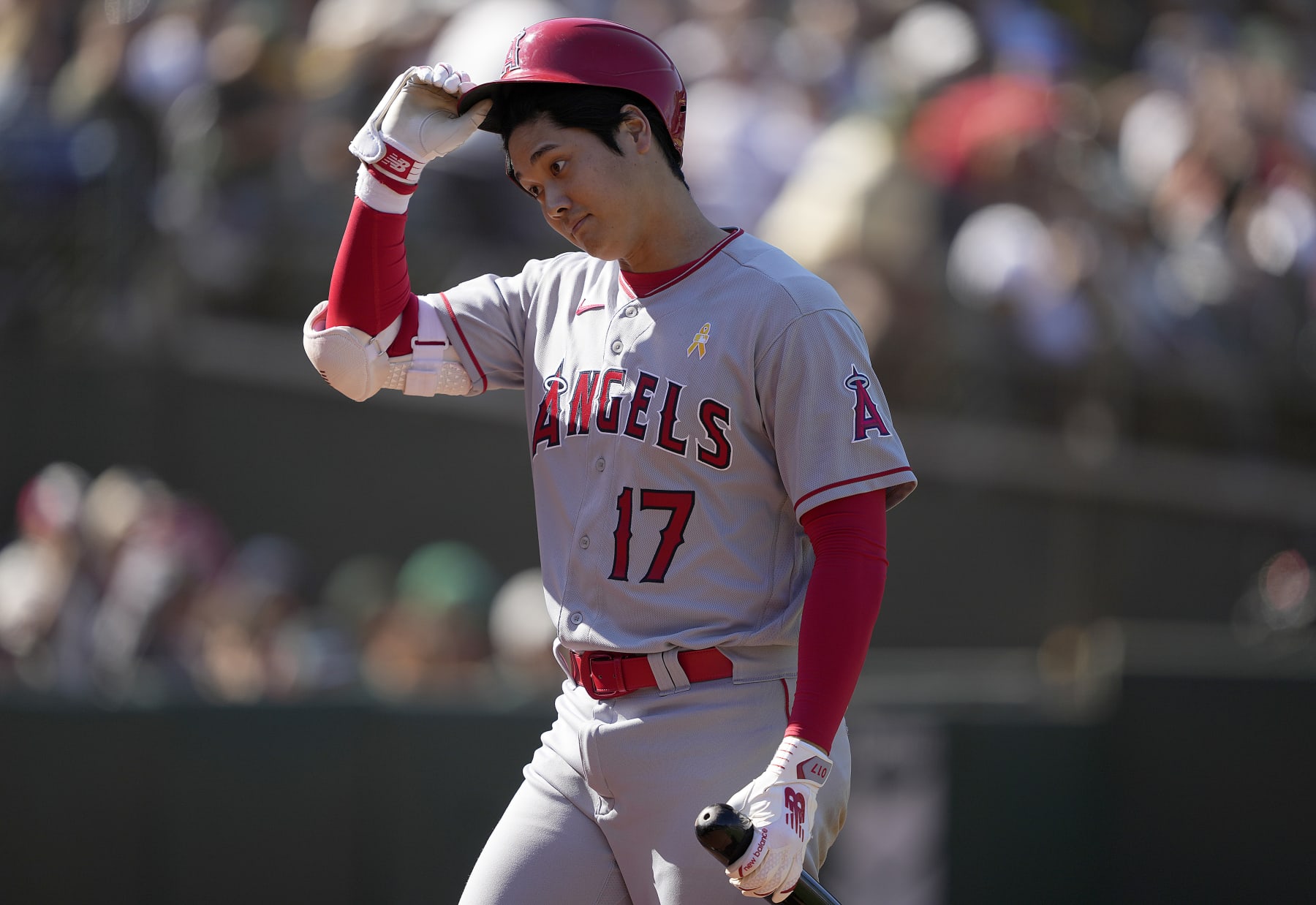 OAKLAND, CALIFORNIA - SEPTEMBER 03: Shohei Ohtani #17 of the Los Angeles Angels walks back to the dugout after striking out swinging against the Oakland Athletics in the top of the ninth inning at RingCentral Coliseum on September 03, 2023 in Oakland, California. Atheltics won the game 10-6. (Photo by Thearon W. Henderson/Getty Images)