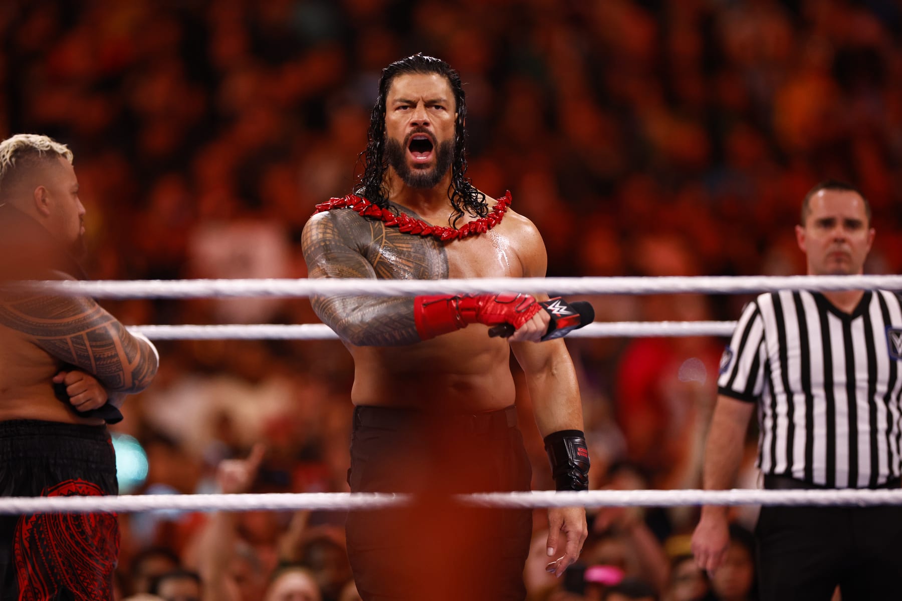 INGLEWOOD, CALIFORNIA - APRIL 02:  (L-R) Cody Rhodes wrestles Roman Reigns for Undisputed WWE Universal Title Match during WrestleMania Goes Hollywood at SoFi Stadium on April 02, 2023 in Inglewood, California.
 (Photo by Ronald Martinez/Getty Images)