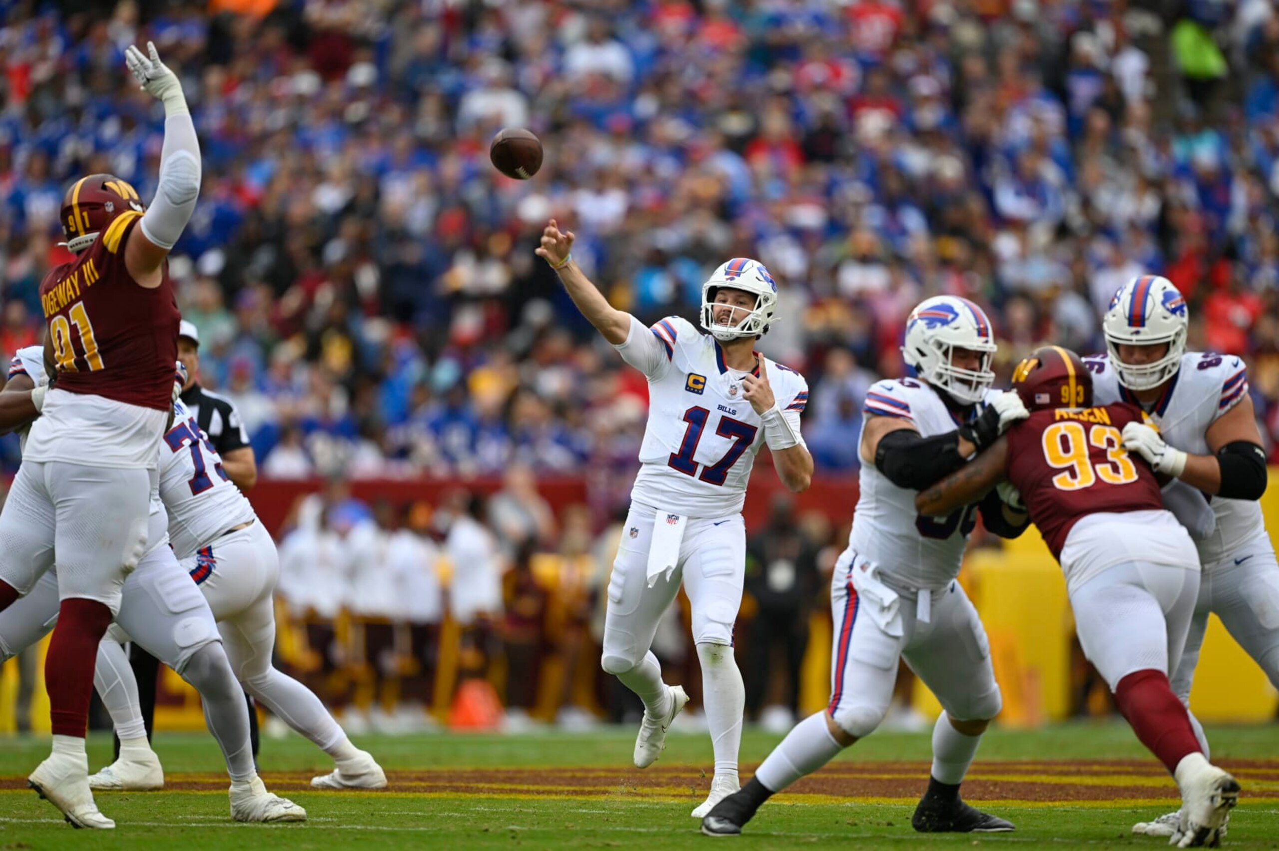 LANDOVER, MD - SEPTEMBER 24: Buffalo Bills quarterback Josh Allen (17) throws a touchdown pass during the first quarter of the game against the Washington Commanders at FedEx Field on September 24, 2023. (Photo by John McDonnell/The Washington Post via Getty Images) LANDOVER, MD - SEPTEMBER 24: Buffalo Bills quarterback Josh Allen (17) throws a touchdown pass during the first quarter of the game against the Washington Commanders at FedEx Field on September 24, 2023. (Photo by John McDonnell/The Washington Post via Getty Images)