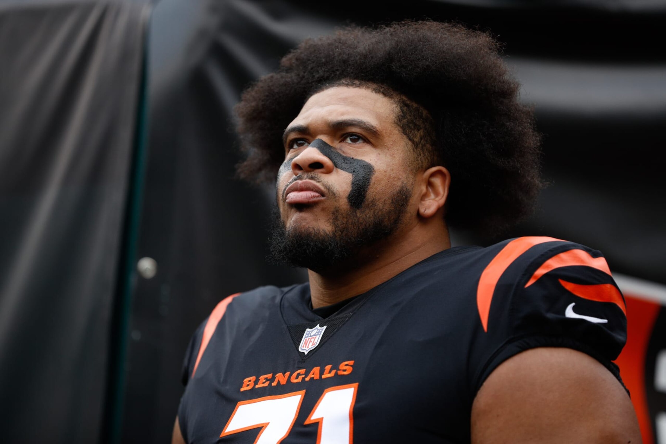 CINCINNATI, OH - DECEMBER 11: Cincinnati Bengals offensive tackle La'el Collins (71) looks onto the field prior to the game against the Cleveland Browns and the Cincinnati Bengals on December 11, 2022, at Paycor Stadium in Cincinnati, OH. (Photo by Ian Johnson/Icon Sportswire via Getty Images) CINCINNATI, OH - DECEMBER 11: Cincinnati Bengals offensive tackle La'el Collins (71) looks onto the field prior to the game against the Cleveland Browns and the Cincinnati Bengals on December 11, 2022, at Paycor Stadium in Cincinnati, OH. (Photo by Ian Johnson/Icon Sportswire via Getty Images)