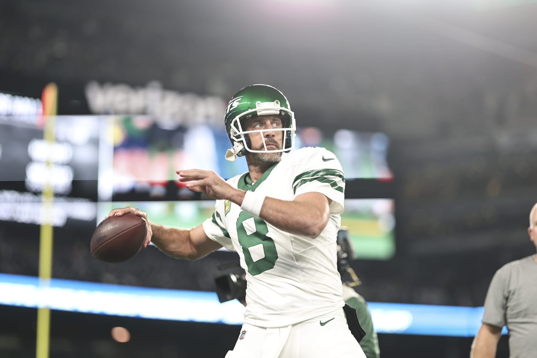 EAST RUTHERFORD, NEW JERSEY - SEPTEMBER 11: Aaron Rodgers #8 of the New York Jets passes as he warms up prior to a game against the Buffalo Bills at MetLife Stadium on September 11, 2023 in East Rutherford, New Jersey. (Photo by Michael Owens/Getty Images)