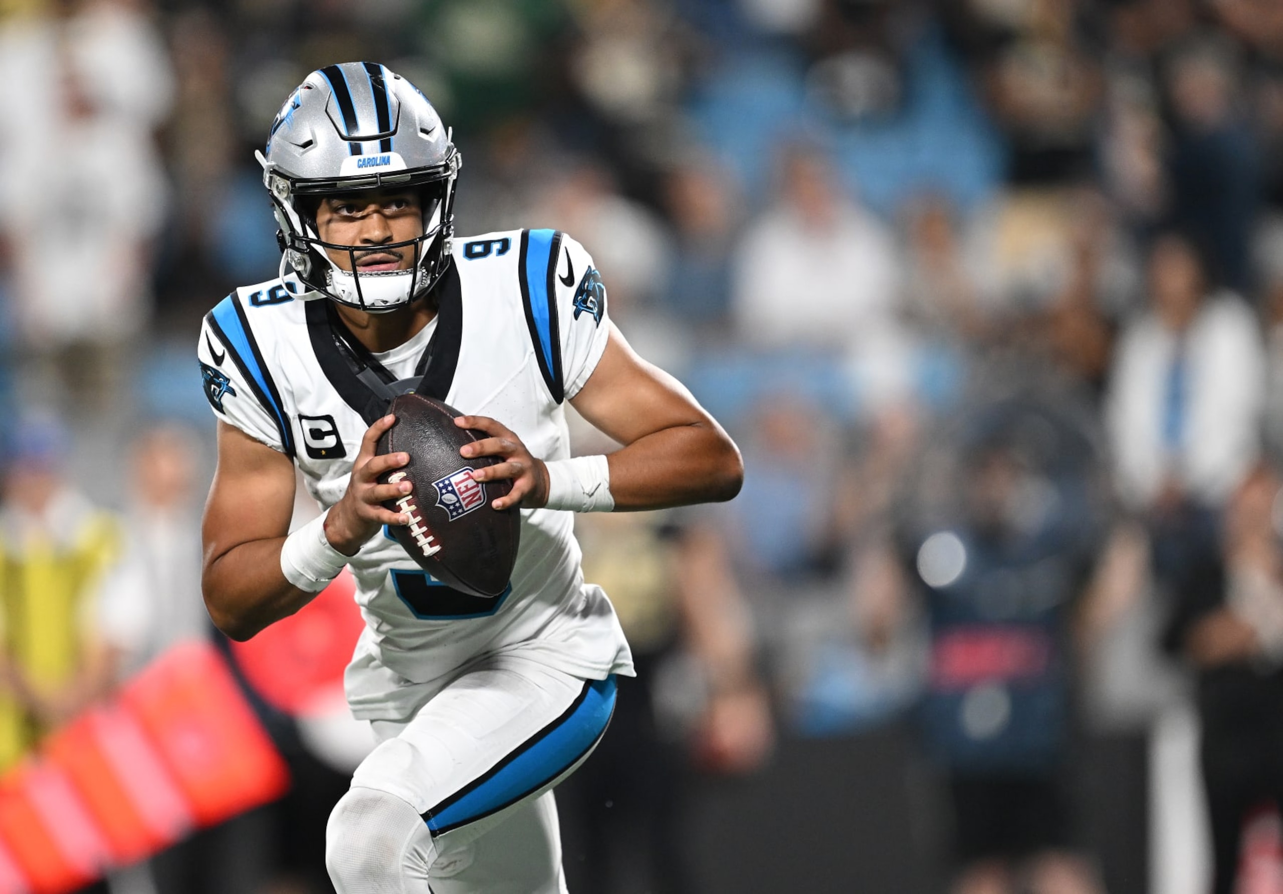 CHARLOTTE, NORTH CAROLINA - SEPTEMBER 18: Bryce Young #9 of the Carolina Panthers rolls out against the New Orleans Saints during their game at Bank of America Stadium on September 18, 2023 in Charlotte, North Carolina. (Photo by Grant Halverson/Getty Images)