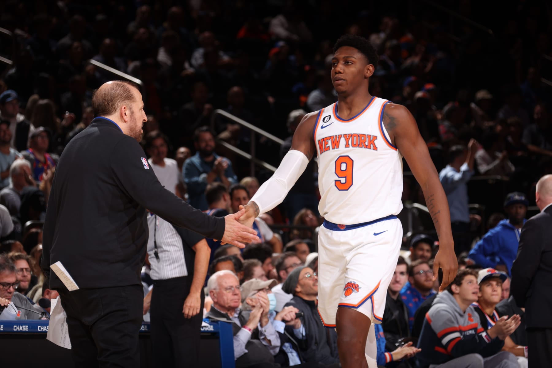NEW YORK, NY - OCTOBER 24: RJ Barrett #9 of the New York Knicks high fives Head Coach Tom Thibodeau during the game against the Orlando Magic on October 24, 2022 at Madison Square Garden in New York City, New York.  NOTE TO USER: User expressly acknowledges and agrees that, by downloading and or using this photograph, User is consenting to the terms and conditions of the Getty Images License Agreement. Mandatory Copyright Notice: Copyright 2022 NBAE  (Photo by Nathaniel S. Butler/NBAE via Getty Images)