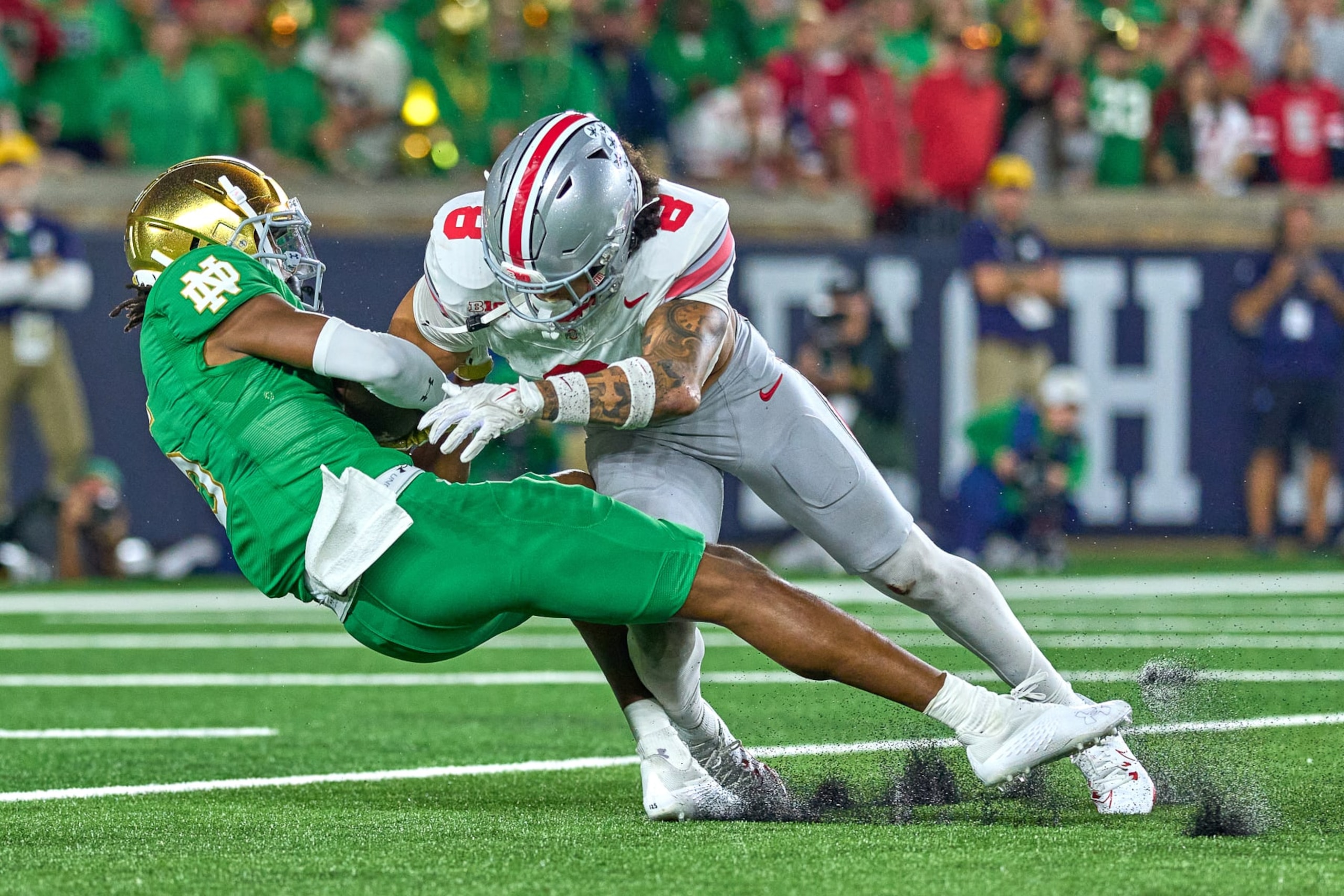 SOUTH BEND, IN - SEPTEMBER 23: Notre Dame Fighting Irish wide receiver Tobias Merriweather (5) battles with Ohio State Buckeyes safety Lathan Ransom (8) to score a touchdown in action during a football game between the Notre Dame Fighting Irish and the Ohio State Buckeyes on September 23, 2023 at Notre Dame Stadium in South Bend, IN. (Photo by Robin Alam/Icon Sportswire via Getty Images)
