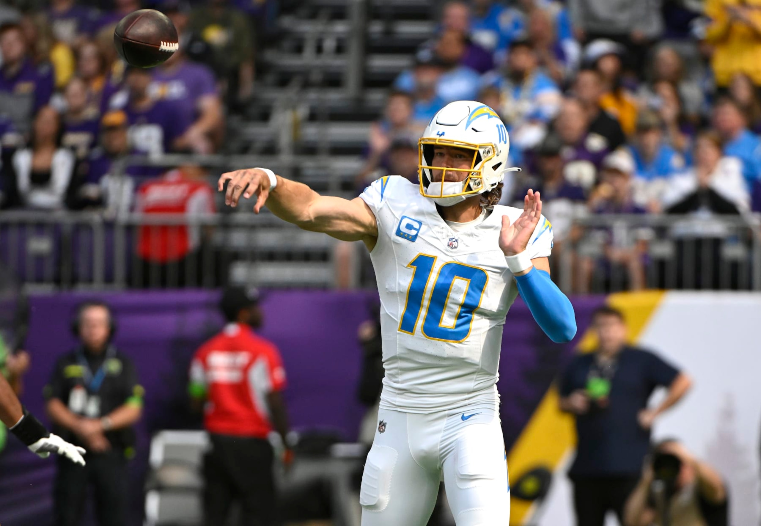 MINNEAPOLIS, MINNESOTA - SEPTEMBER 24: Justin Herbert #10 of the Los Angeles Chargers attempts a pass during the second half against the Minnesota Vikings at U.S. Bank Stadium on September 24, 2023 in Minneapolis, Minnesota. (Photo by Stephen Maturen/Getty Images)