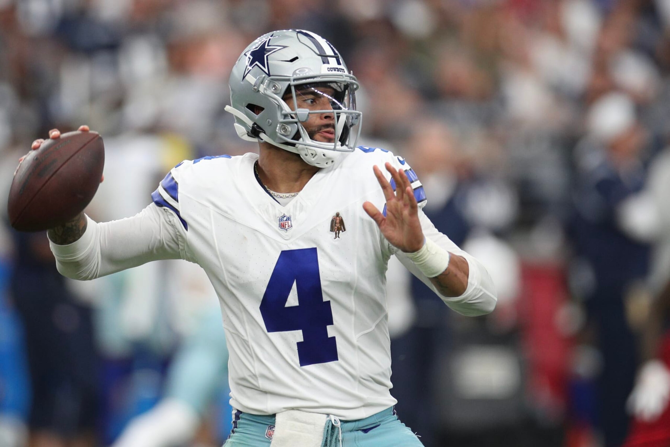 GLENDALE, ARIZONA - SEPTEMBER 24: Dak Prescott #4 of the Dallas Cowboys looks to pass during the fourth quarter of a game against the Arizona Cardinals at State Farm Stadium on September 24, 2023 in Glendale, Arizona. (Photo by Mike Christy/Getty Images)