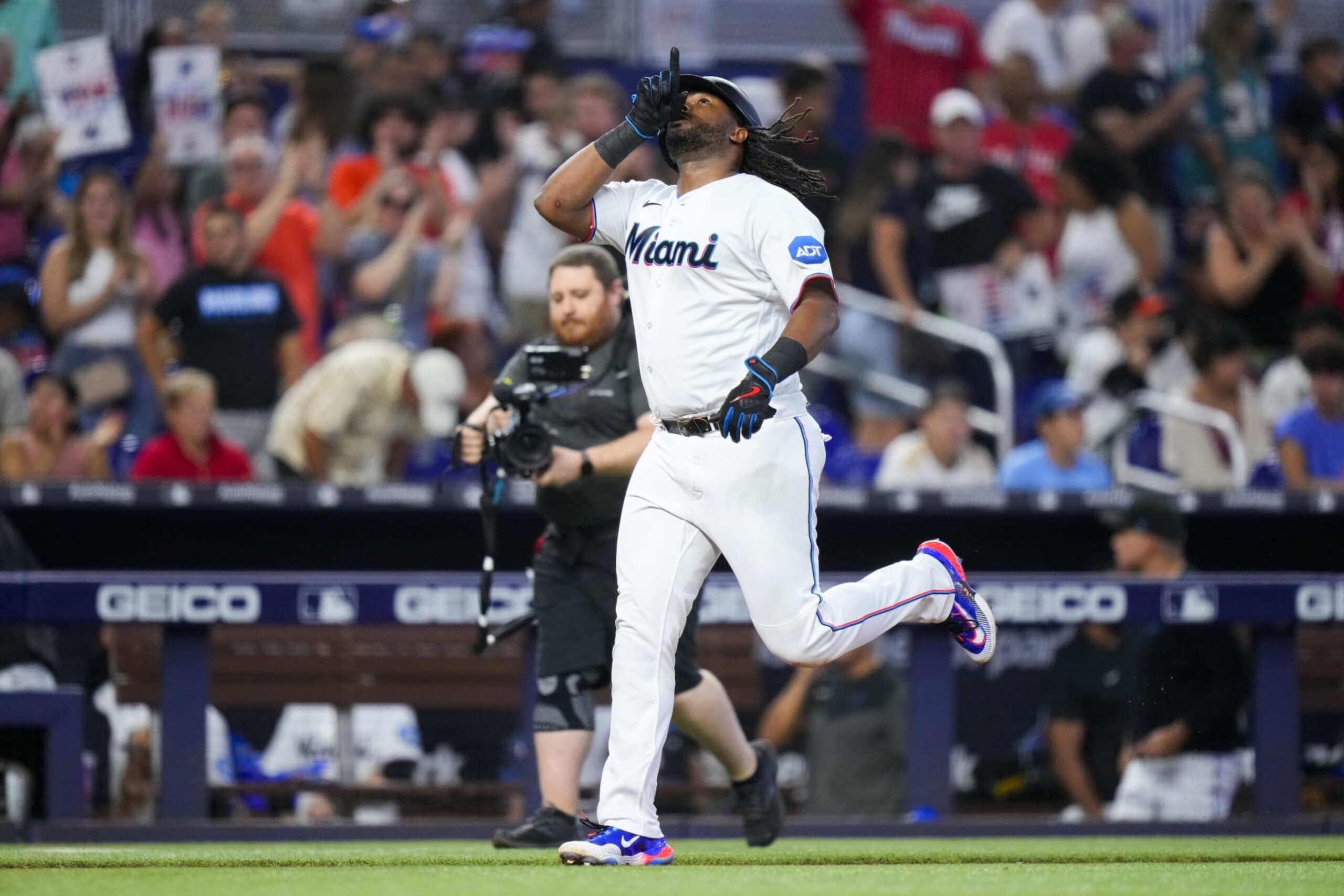 MIAMI, FLORIDA - SEPTEMBER 24: Josh Bell #9 of the Miami Marlins celbrates after hitting a home run against the Milwaukee Brewers during the third inning at loanDepot park on September 24, 2023 in Miami, Florida. (Photo by Rich Storry/Getty Images)
