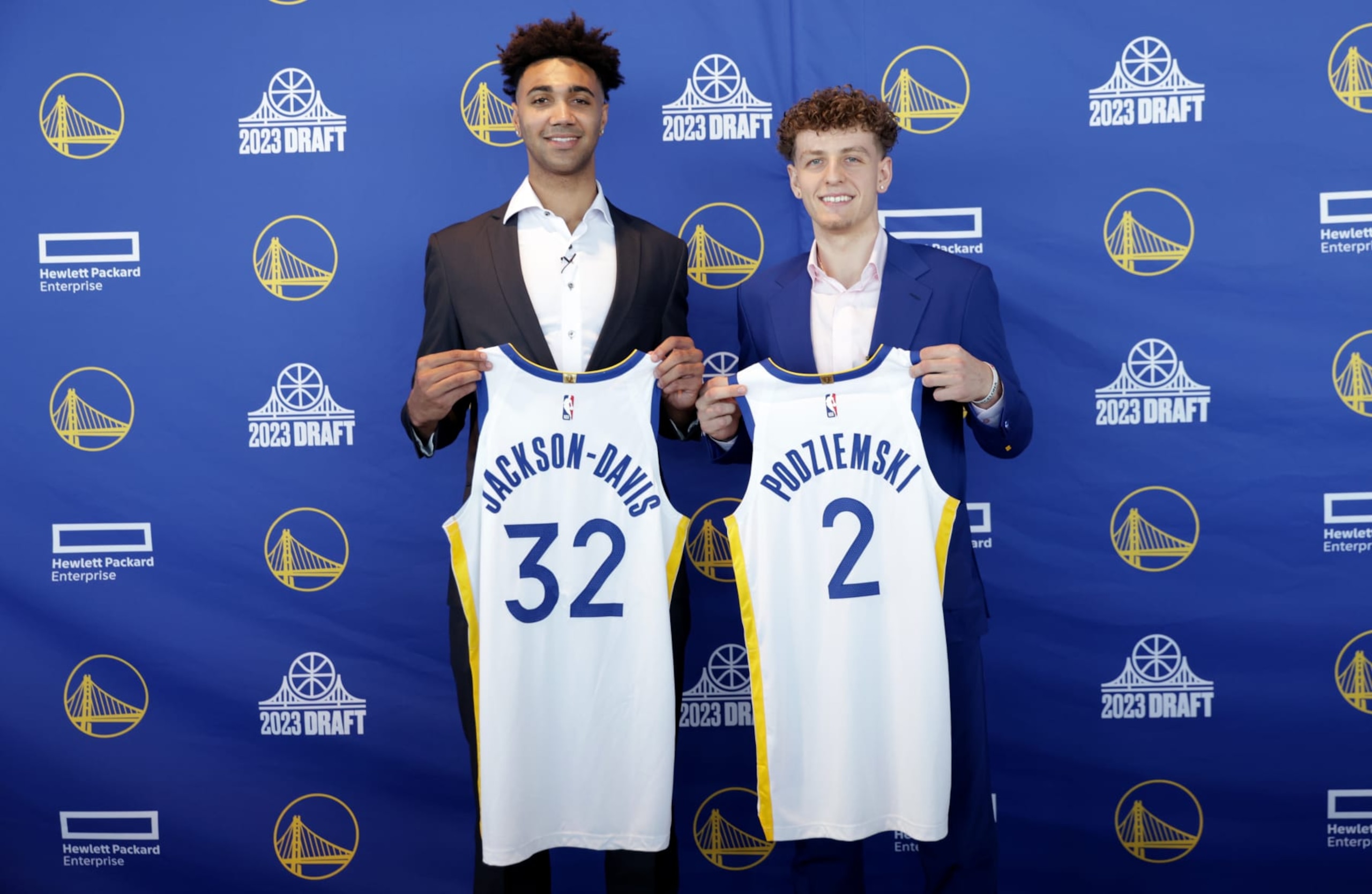 SAN FRANCISCO, CA - JUNE 23: Golden State Warriors' Trayce Jackson-Davis, left and Brandin Podziemski, right, pose for a photo during a press conference on June 23, 2023 at Chase Center in San Francisco, California. NOTE TO USER: User expressly acknowledges and agrees that, by downloading and or using this photograph, user is consenting to the terms and conditions of Getty Images License Agreement. Mandatory Copyright Notice: Copyright 2023 NBAE (Photo by Jed Jacobsohn/NBAE via Getty Images)