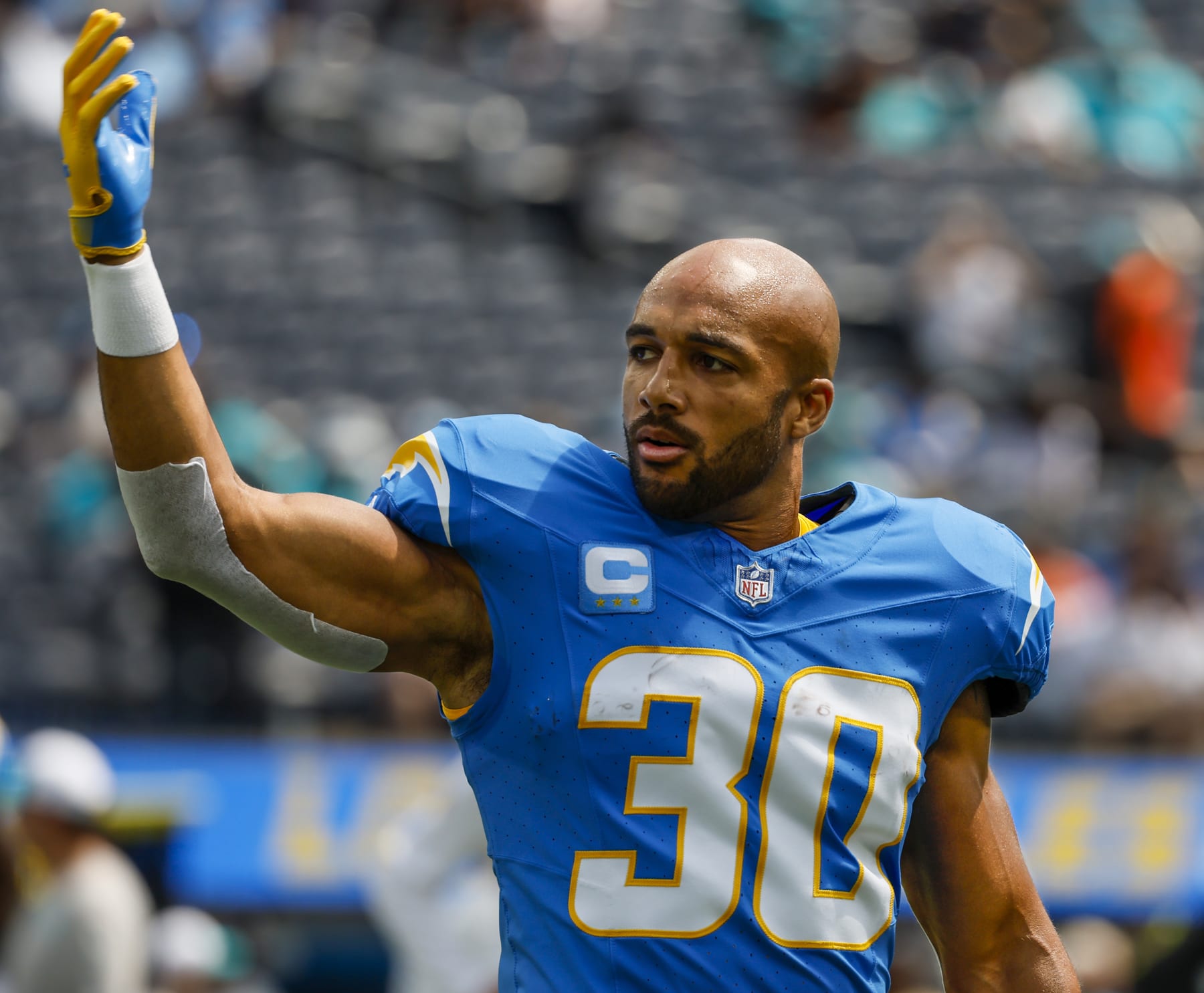 Inglewood, CA, Sunday, Sept. 10, 2023 - Los Angeles Chargers running back Austin Ekeler (30) calls teammates to the sideline before a game against the Miami Dolphins at SoFi Stadium.  (Robert Gauthier/Los Angeles Times via Getty Images)