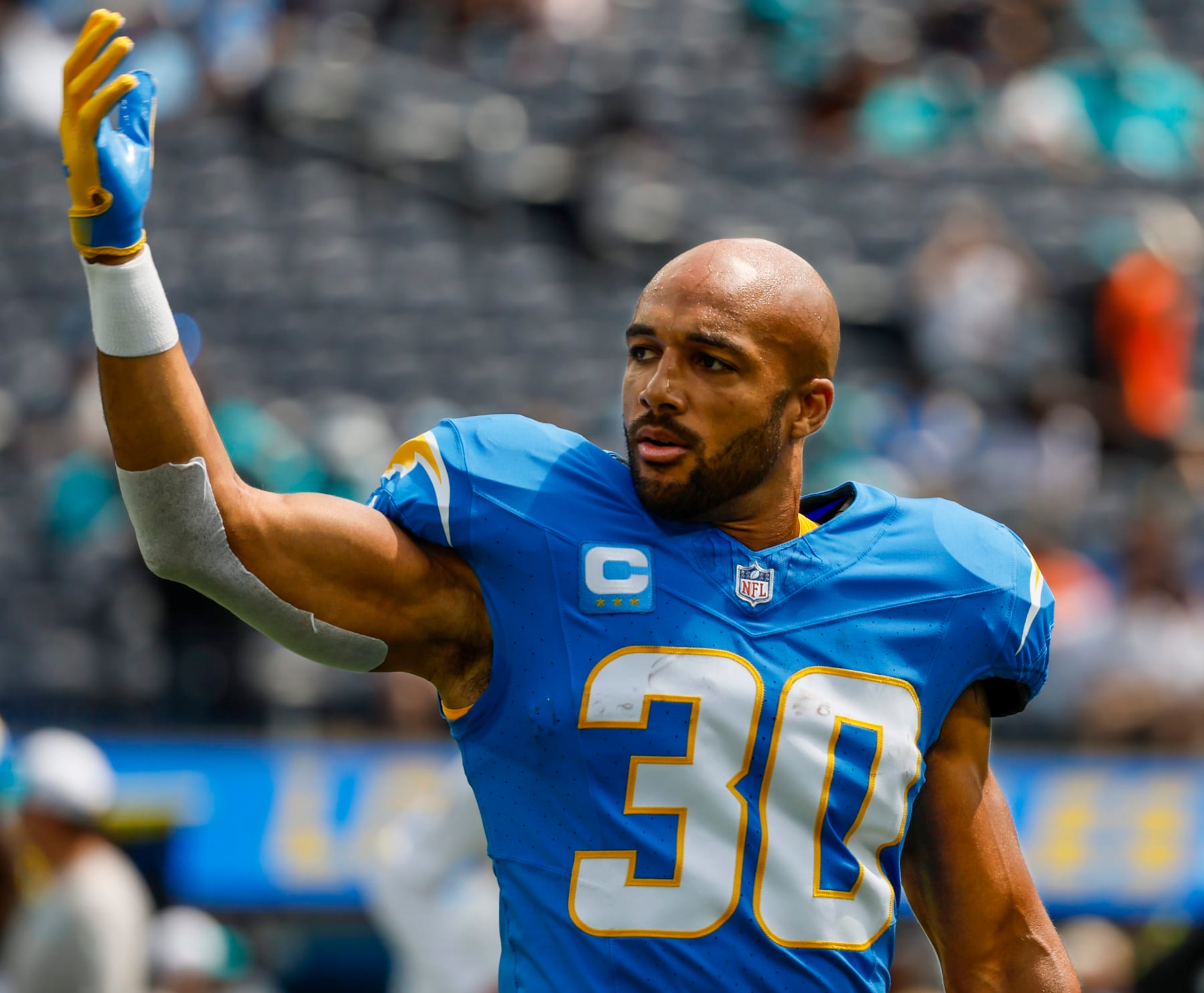 Inglewood, CA, Sunday, Sept. 10, 2023 - Los Angeles Chargers running back Austin Ekeler (30) calls teammates to the sideline before a game against the Miami Dolphins at SoFi Stadium.  (Robert Gauthier/Los Angeles Times via Getty Images)
