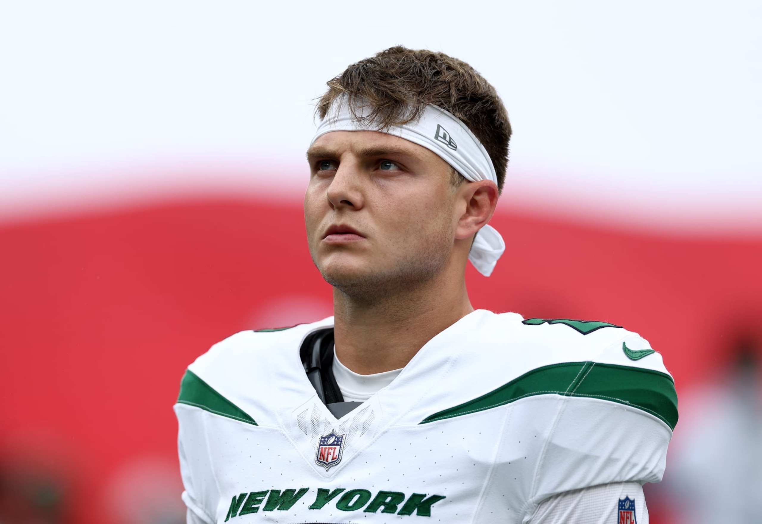 EAST RUTHERFORD, NEW JERSEY - SEPTEMBER 24: Zach Wilson #2 of the New York Jets stands on the field before the start of the game against the New England Patriots at MetLife Stadium on September 24, 2023 in East Rutherford, New Jersey. (Photo by Elsa/Getty Images)