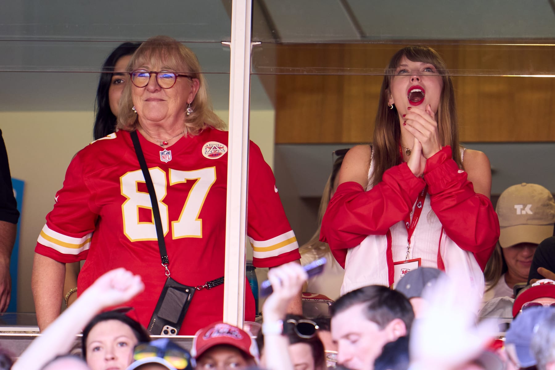 KANSAS CITY, MO - SEPTEMBER 24: Taylor Swift cheers from a suite with Donna Kelce as the Kansas City Chiefs play the Chicago Bears during the first half at GEHA Field at Arrowhead Stadium on September 24, 2023 in Kansas City, Missouri. (Photo by Cooper Neill/Getty Images)