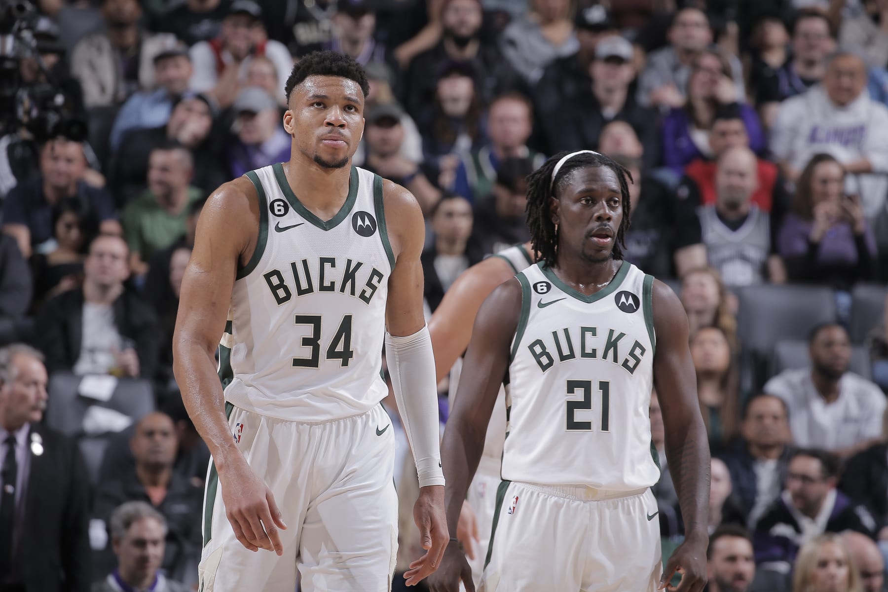 SACRAMENTO, CA - MARCH 13: Giannis Antetokounmpo #34 and Jrue Holiday #21 of the Milwaukee Bucks look on during the game against the Sacramento Kings on March 13, 2023 at Golden 1 Center in Sacramento, California. NOTE TO USER: User expressly acknowledges and agrees that, by downloading and or using this photograph, User is consenting to the terms and conditions of the Getty Images Agreement. Mandatory Copyright Notice: Copyright 2023 NBAE (Photo by Rocky Widner/NBAE via Getty Images)