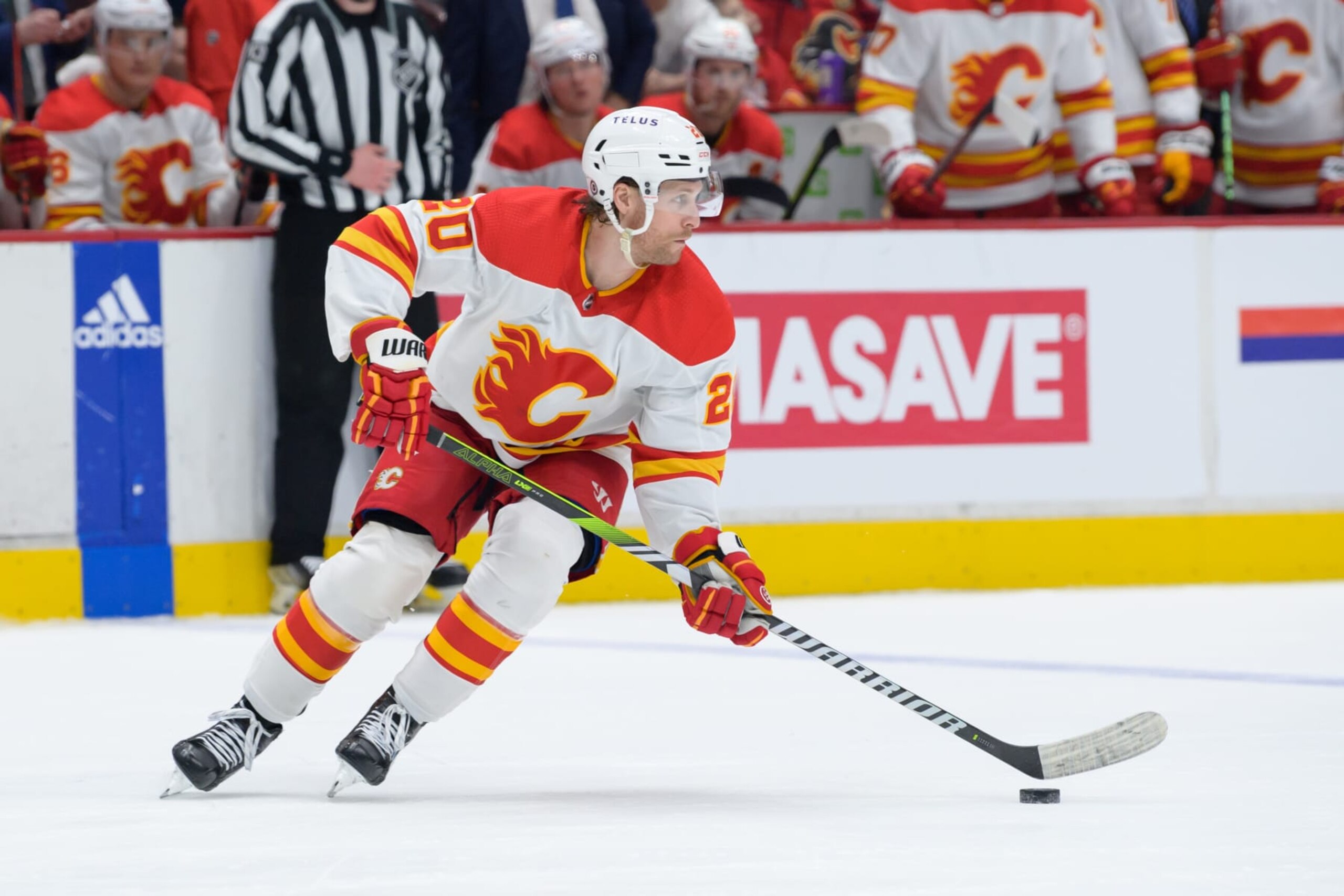 VANCOUVER, CANADA - APRIL 8: Blake Coleman #20 of the Calgary Flames skates with the puck during the third period of their NHL game against the Vancouver Canucks at Rogers Arena on April 8, 2023 in Vancouver, British Columbia, Canada. (Photo by Derek Cain/Getty Images)