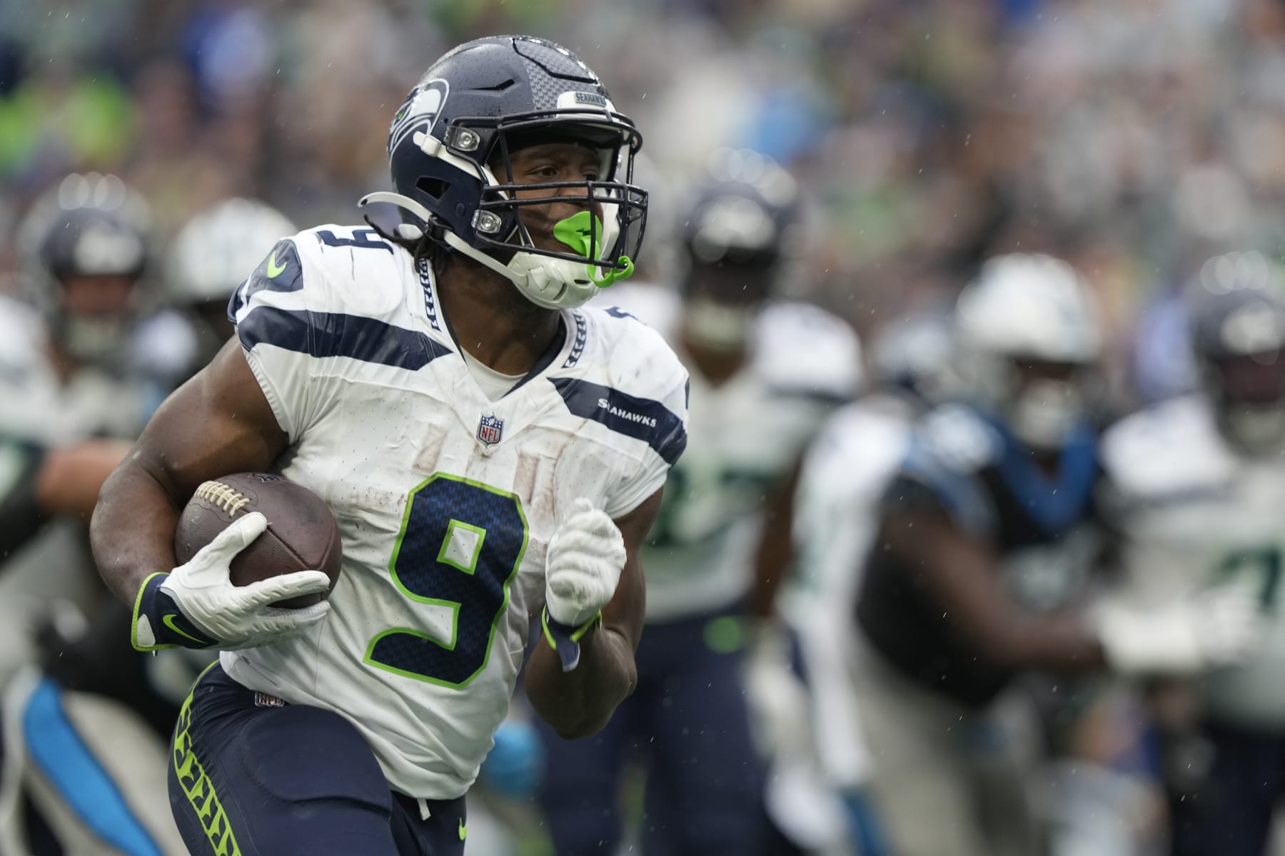 SEATTLE, WASHINGTON - SEPTEMBER 24: Kenneth Walker III #9 of the Seattle Seahawks runs the ball for a touchdown during the fourth quarter against the Carolina Panthers at Lumen Field on September 24, 2023 in Seattle, Washington. (Photo by Christopher Mast/Getty Images)
