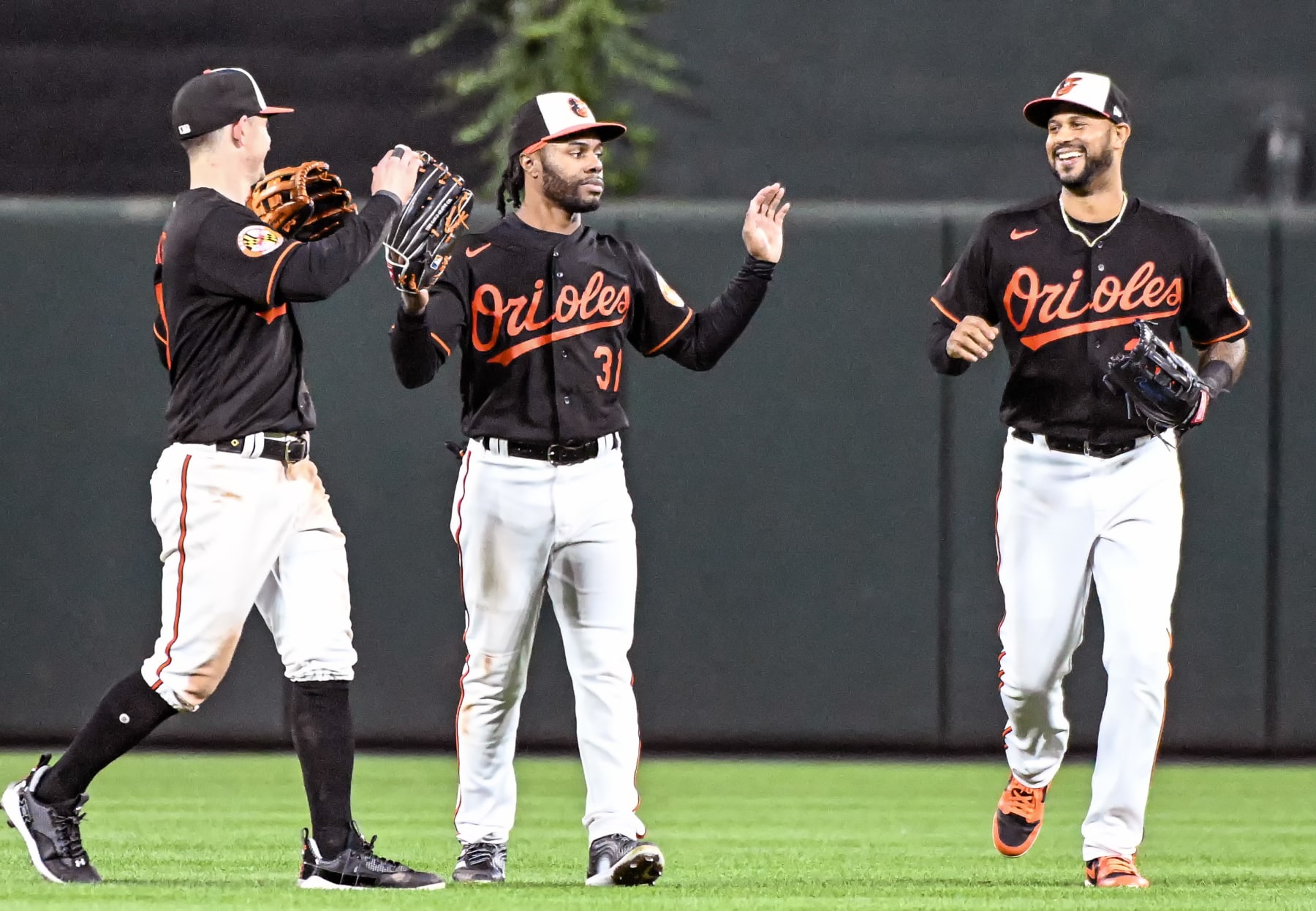 Austin Hays (L), Cedric Mullins (C) and Aaron Hicks (R)