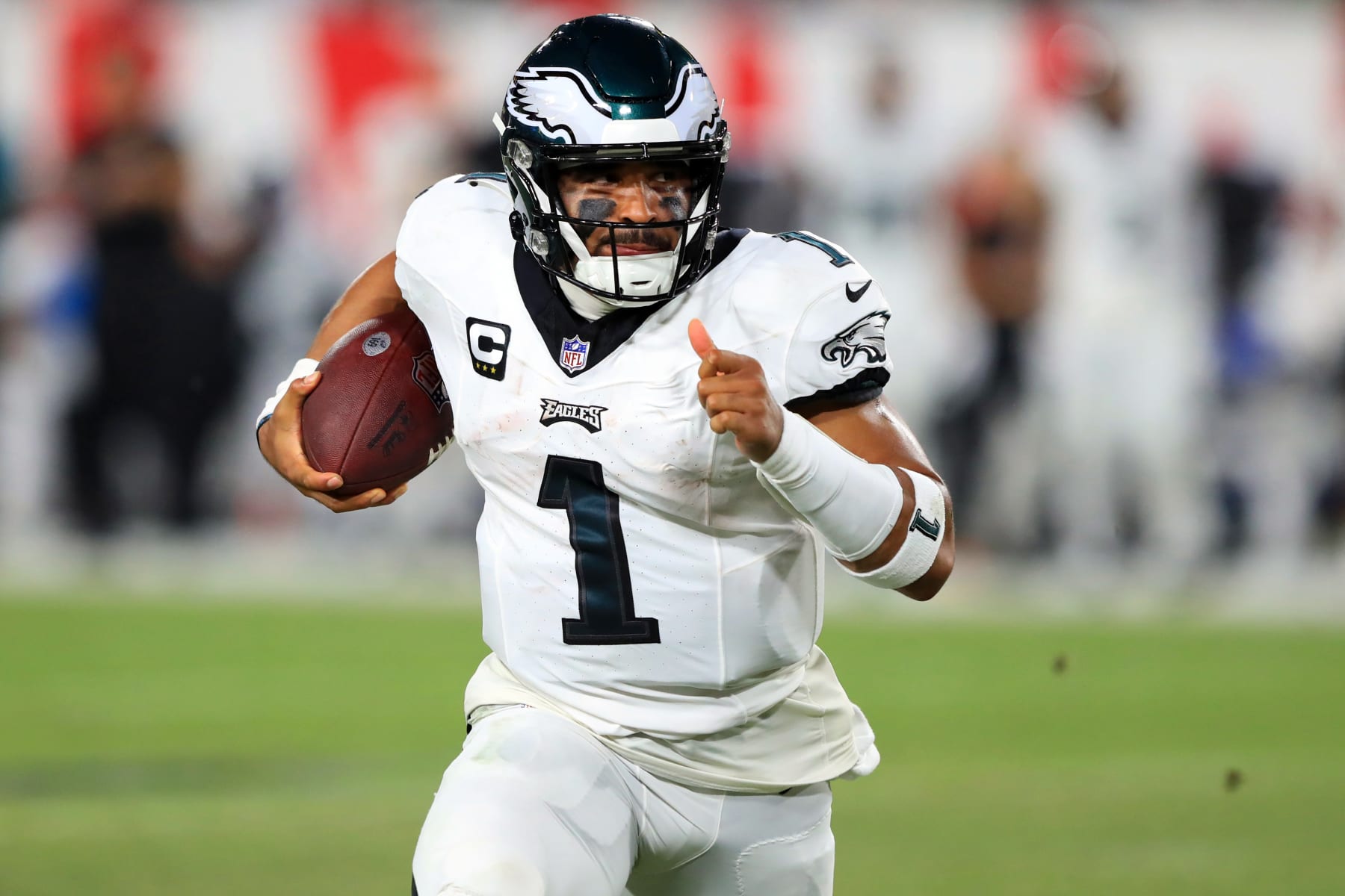 TAMPA, FL - SEPTEMBER 25: Philadelphia Eagles Quarterback Jalen Hurts (1) scrambles for a first down during the regular season game between the Philadelphia Eagles and the Tampa Bay Buccaneers on September 25, 2023 at Raymond James Stadium in Tampa, Florida. (Photo by Cliff Welch/Icon Sportswire via Getty Images)