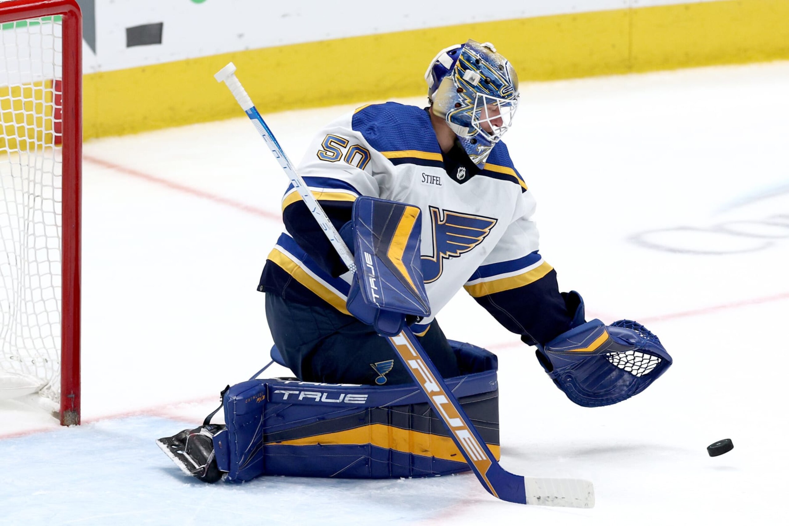 DALLAS, TEXAS - APRIL 13: Jordan Binnington #50 of the St. Louis Blues blocks a shot on goal the Dallas Stars in the third period at American Airlines Center on April 13, 2023 in Dallas, Texas. (Photo by Tom Pennington/Getty Images)