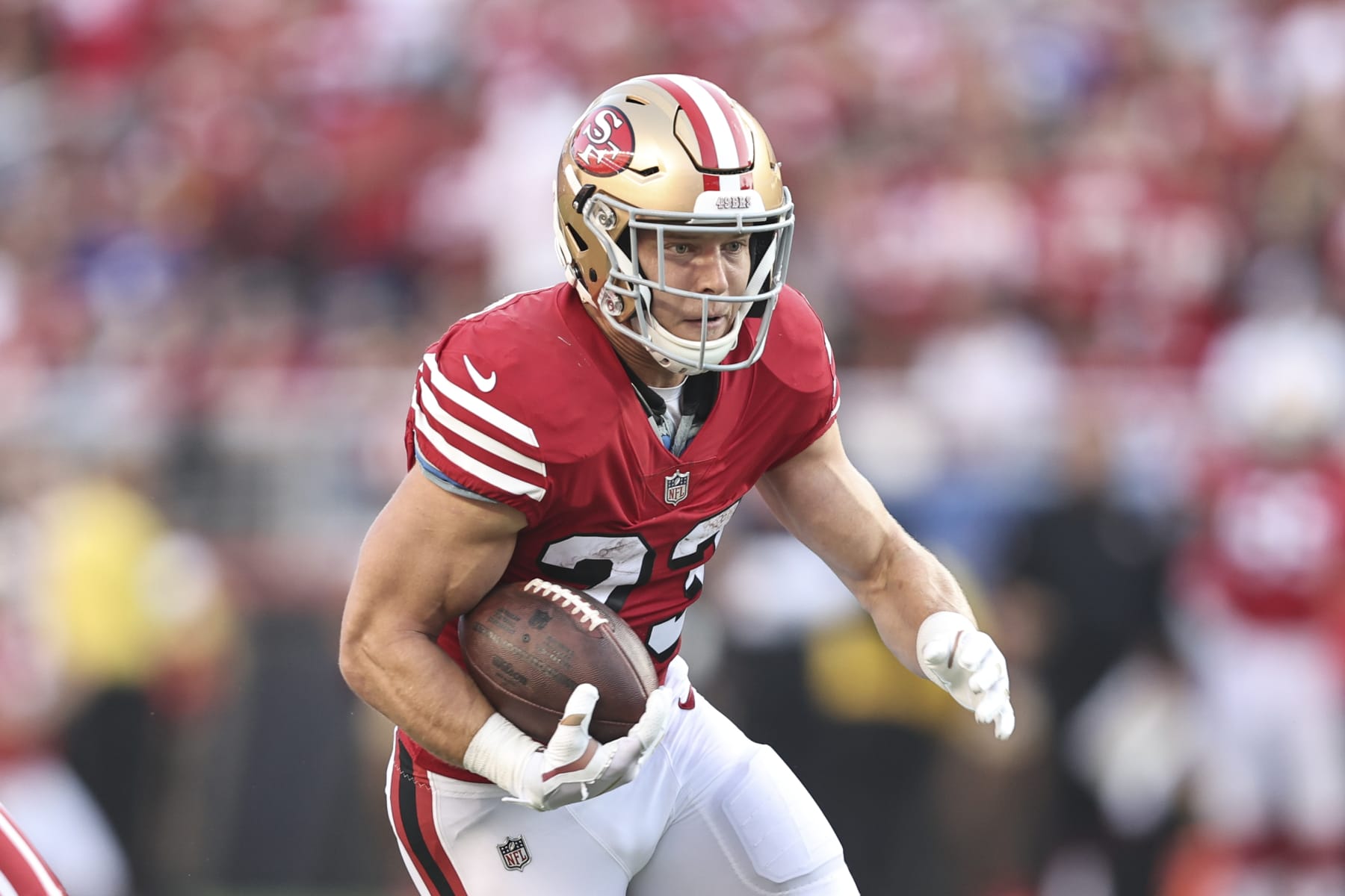 SANTA CLARA, CALIFORNIA - SEPTEMBER 21: Christian McCaffrey #23 of the San Francisco 49ers runs with the ball during an NFL football game between the San Francisco 49ers and the New York Giants at Levi's Stadium on September 21, 2023 in Santa Clara, California. (Photo by Michael Owens/Getty Images)