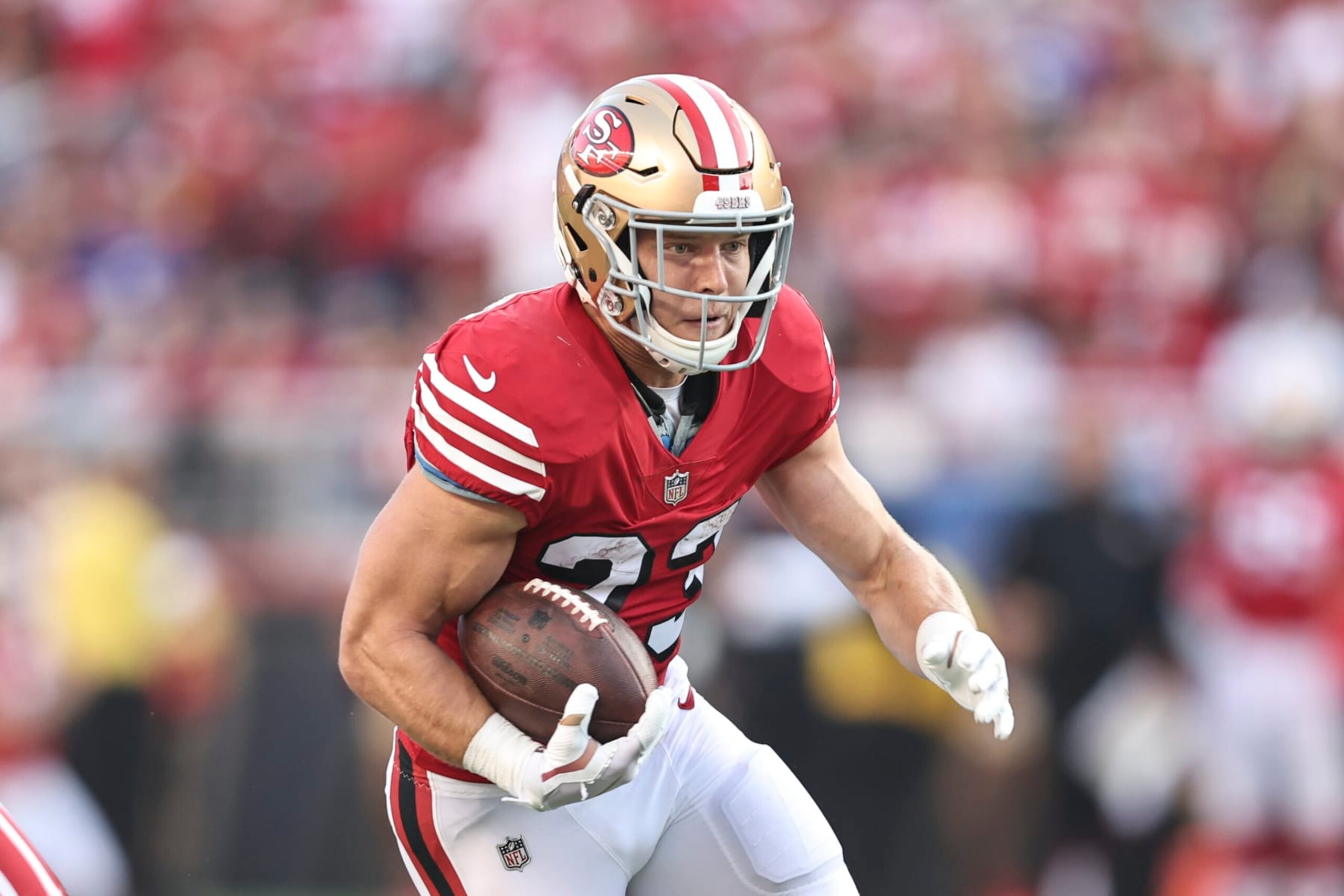 SANTA CLARA, CALIFORNIA - SEPTEMBER 21: Christian McCaffrey #23 of the San Francisco 49ers runs with the ball during an NFL football game between the San Francisco 49ers and the New York Giants at Levi's Stadium on September 21, 2023 in Santa Clara, California. (Photo by Michael Owens/Getty Images)