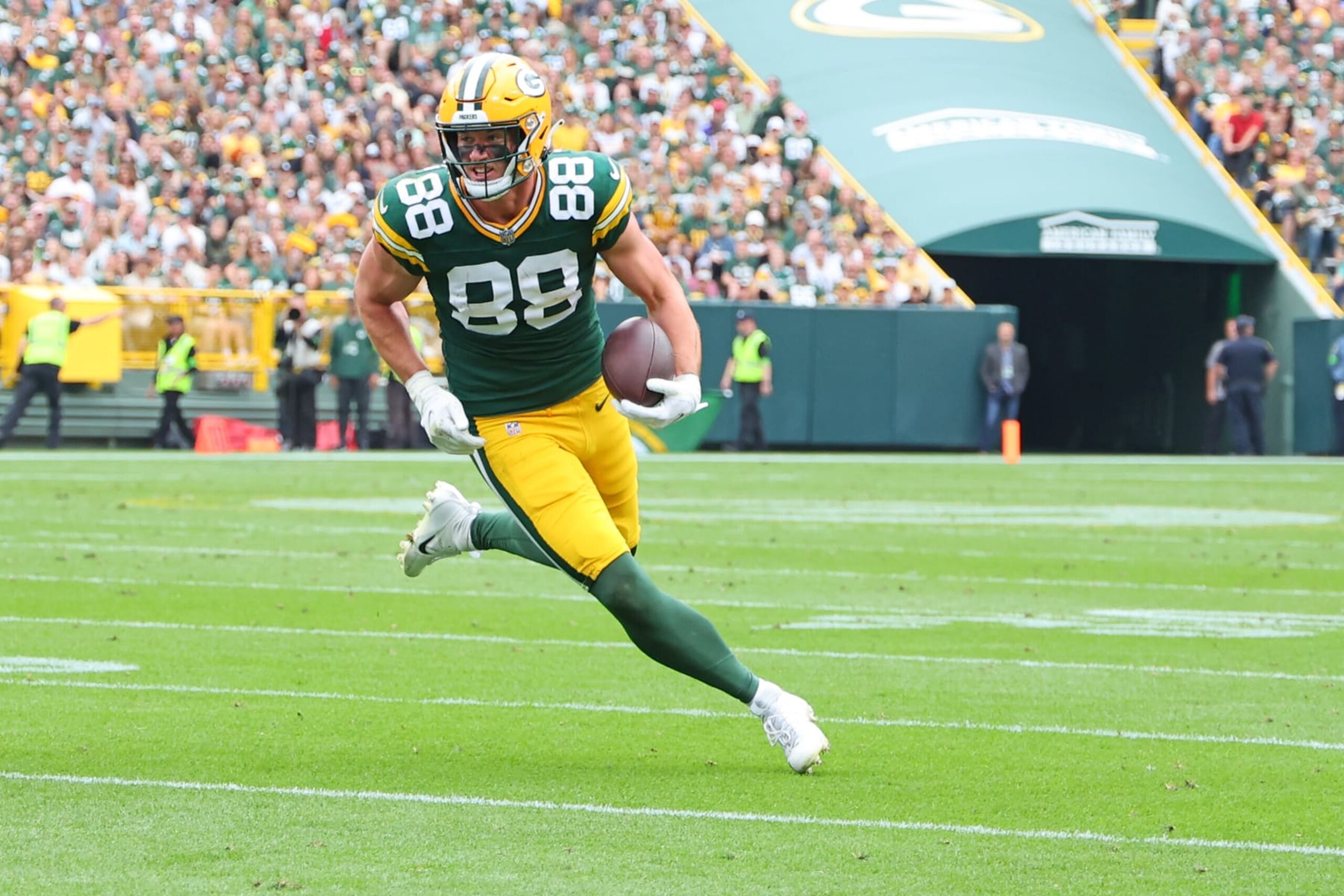 GREEN BAY, WISCONSIN - SEPTEMBER 24: Luke Musgrave #88 of the Green Bay Packers runs for yards after a catch during a game against the New Orleans Saints at Lambeau Field on September 24, 2023 in Green Bay, Wisconsin. (Photo by Stacy Revere/Getty Images)