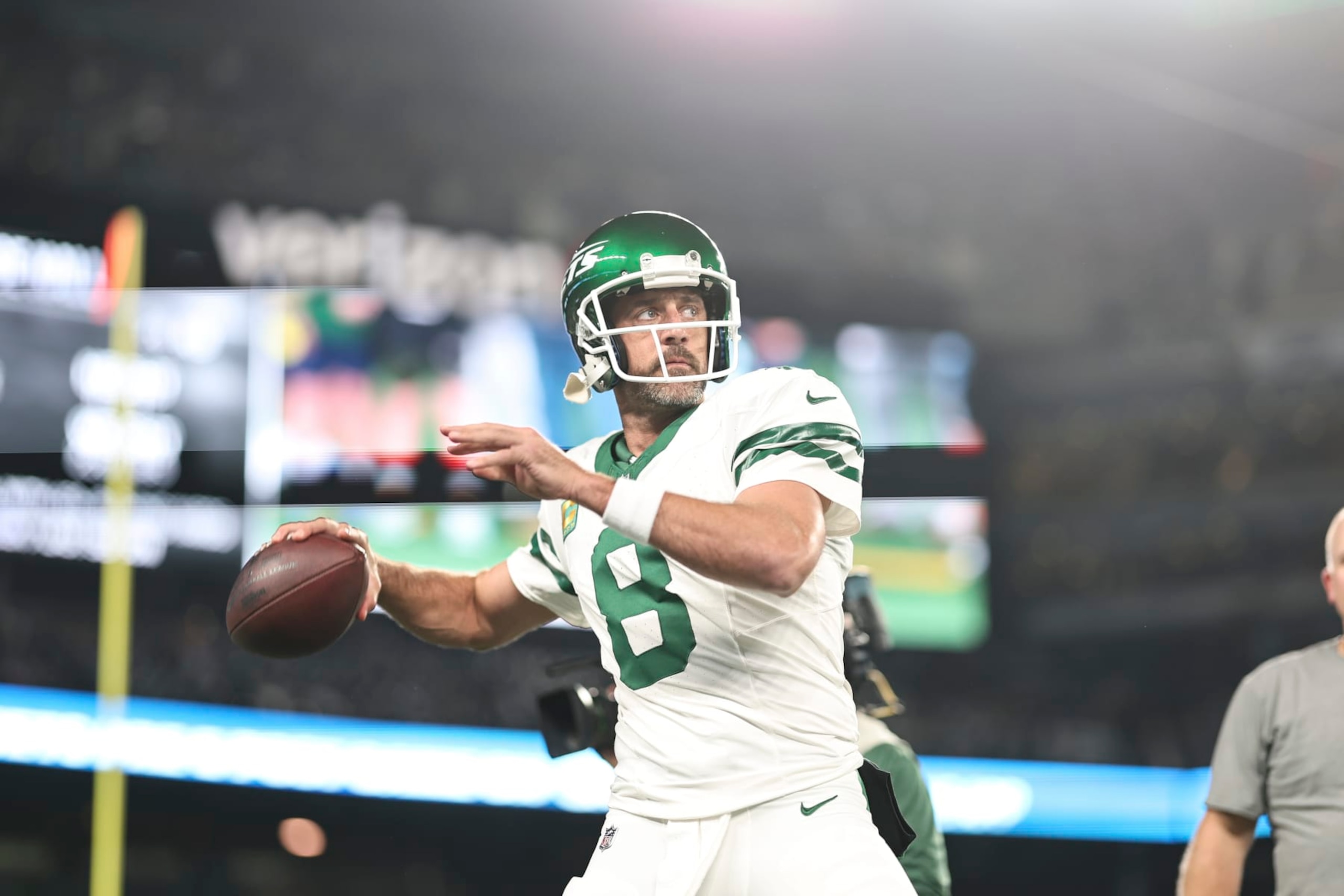 EAST RUTHERFORD, NEW JERSEY - SEPTEMBER 11: Aaron Rodgers #8 of the New York Jets passes as he warms up prior to a game against the Buffalo Bills at MetLife Stadium on September 11, 2023 in East Rutherford, New Jersey. (Photo by Michael Owens/Getty Images)