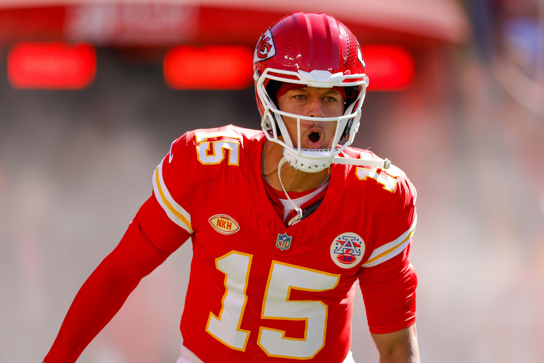 KANSAS CITY, MISSOURI - SEPTEMBER 24: Patrick Mahomes #15 of the Kansas City Chiefs runs on to the field prior to the game against the Chicago Bears at GEHA Field at Arrowhead Stadium on September 24, 2023 in Kansas City, Missouri. (Photo by David Eulitt/Getty Images)