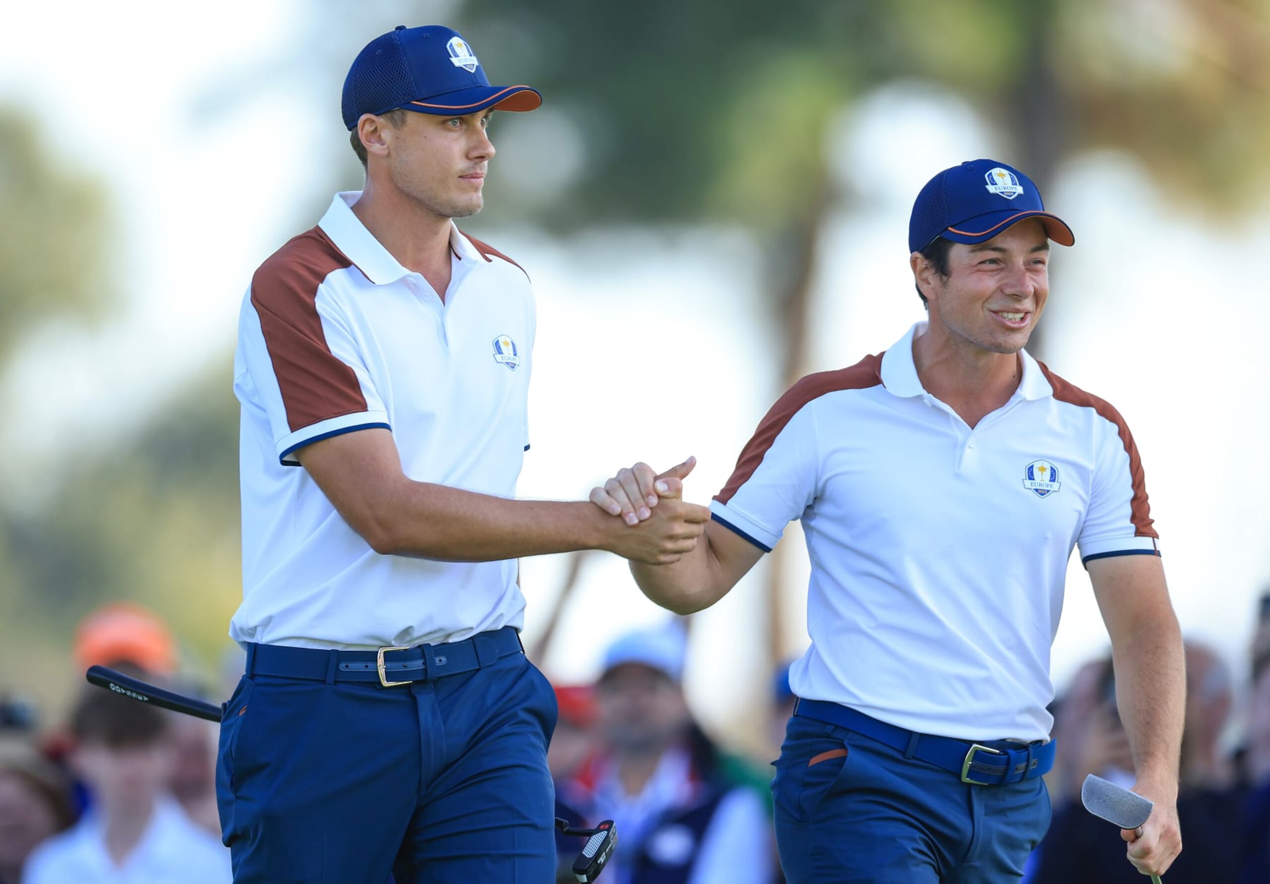 ROME, ITALY - SEPTEMBER 30: Ludwig Aberg of Sweden and The European Team and his partner Viktor Hovland celebrate after they had won the sixth hole in their match against Brooks Koepka and Scottie Scheffler during the Saturday morning foursomes matches of the 2023 Ryder Cup at Marco Simone Golf Club on September 30, 2023 in Rome, Italy. (Photo by David Cannon/Getty Images)