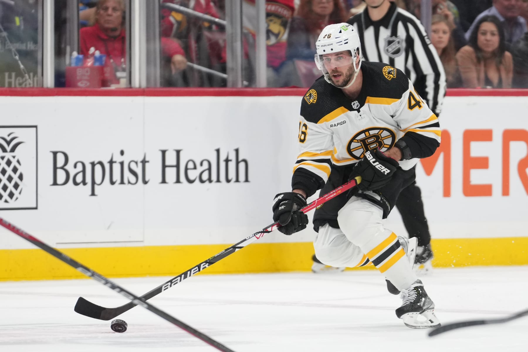 SUNRISE, FL - APRIL 23: Boston Bruins defenseman Matt Grzelcyk (48) brings the puck down ice during game six of  the first round of the Eastern Conference Playoffs between the Boston Bruins and the Florida Panthers on Friday, April 28, 2023 at FLA Live Arena in Sunrise, Fla  (Photo by Peter Joneleit/Icon Sportswire via Getty Images)