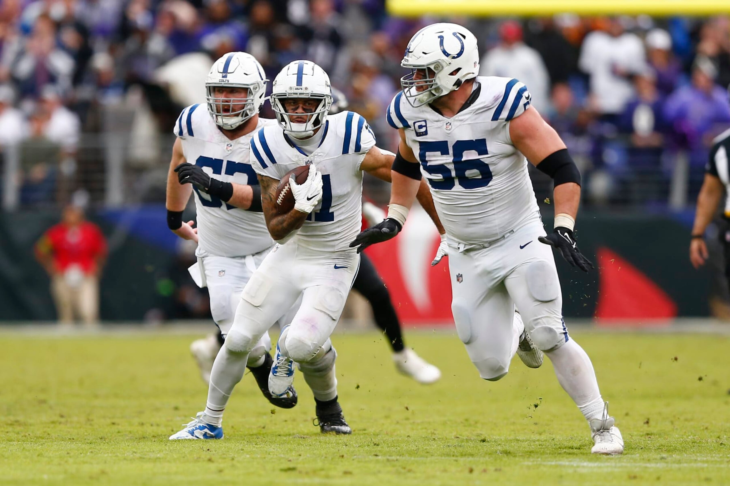 BALTIMORE, MD - SEPTEMBER 24: Indianapolis Colts wide receiver Michael Pittman Jr. (11) heads up field with Indianapolis Colts guard Quenton Nelson (56) leading the way during the NFL game between the Indianapolis Colts and the Baltimore Ravens on September 24, 2023 at M&T Bank Stadium in Baltimore, MD. (Photo by Jeffrey Brown/Icon Sportswire via Getty Images)