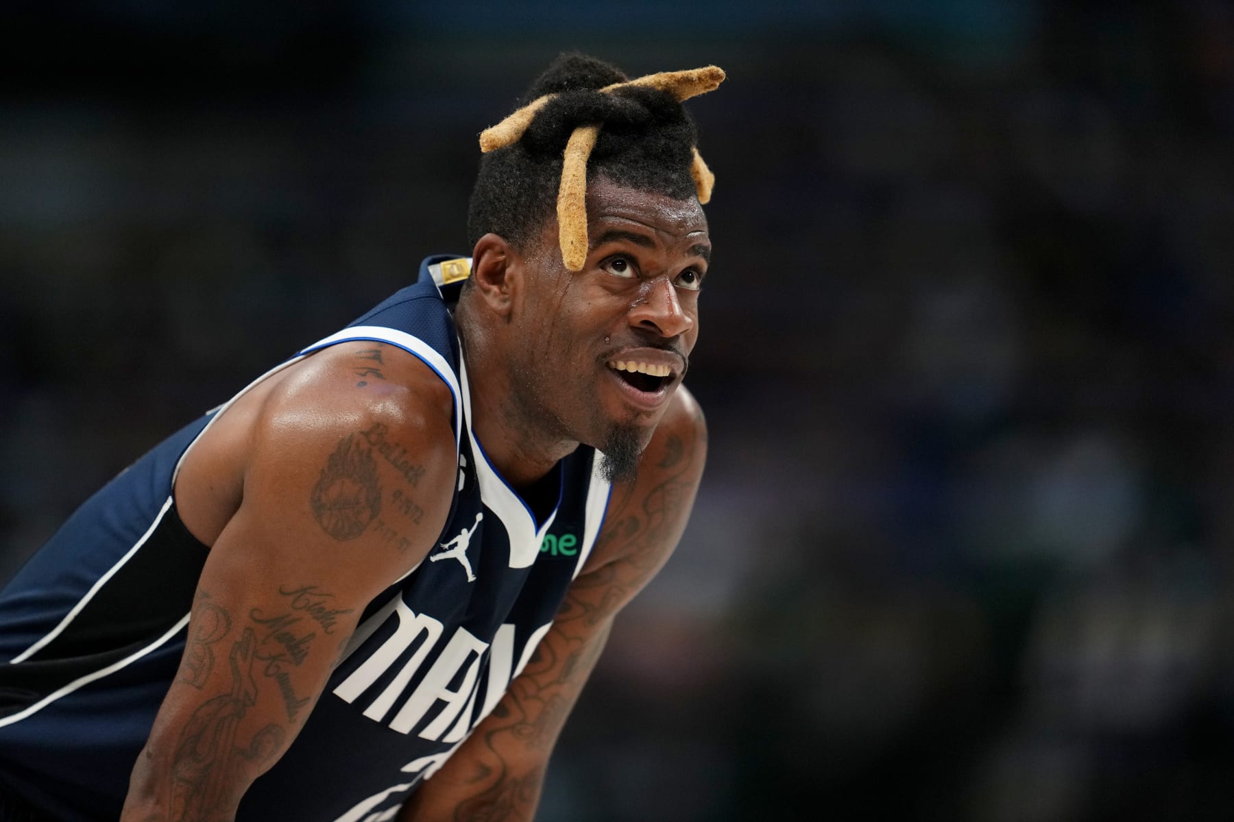 DALLAS, TX - MARCH 22:  Reggie Bullock #25 of the Dallas Mavericks looks on during the game against the Golden State Warriors on March 22, 2023 at the American Airlines Center in Dallas, Texas. NOTE TO USER: User expressly acknowledges and agrees that, by downloading and or using this photograph, User is consenting to the terms and conditions of the Getty Images License Agreement. Mandatory Copyright Notice: Copyright 2023 NBAE (Photo by Cooper Neill/NBAE via Getty Images)