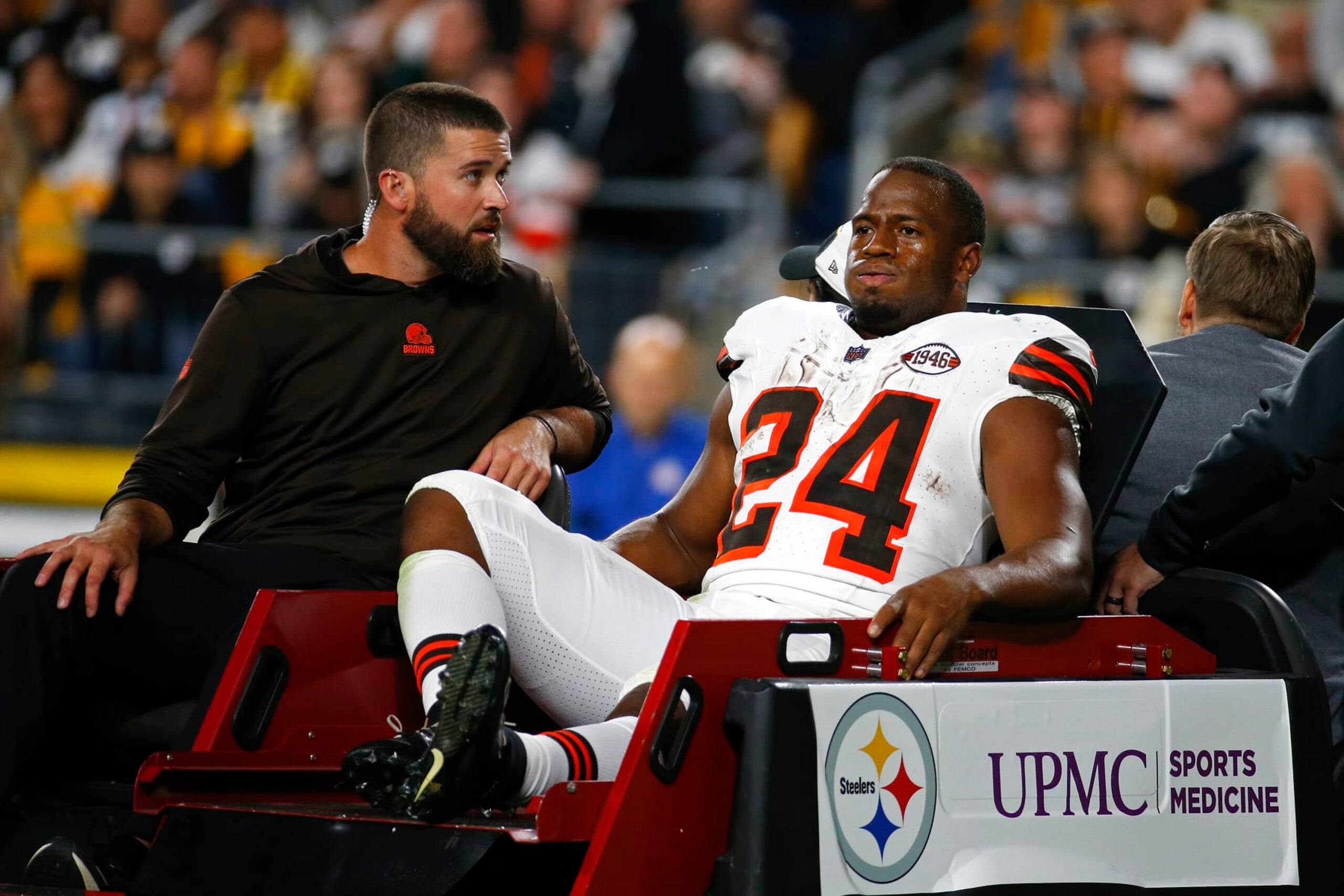 PITTSBURGH, PENNSYLVANIA - SEPTEMBER 18:  Nick Chubb #24 of the Cleveland Browns is carted off the field after sustaining a knee injury during the second quarter against the Pittsburgh Steelers at Acrisure Stadium on September 18, 2023 in Pittsburgh, Pennsylvania. (Photo by Justin K. Aller/Getty Images)