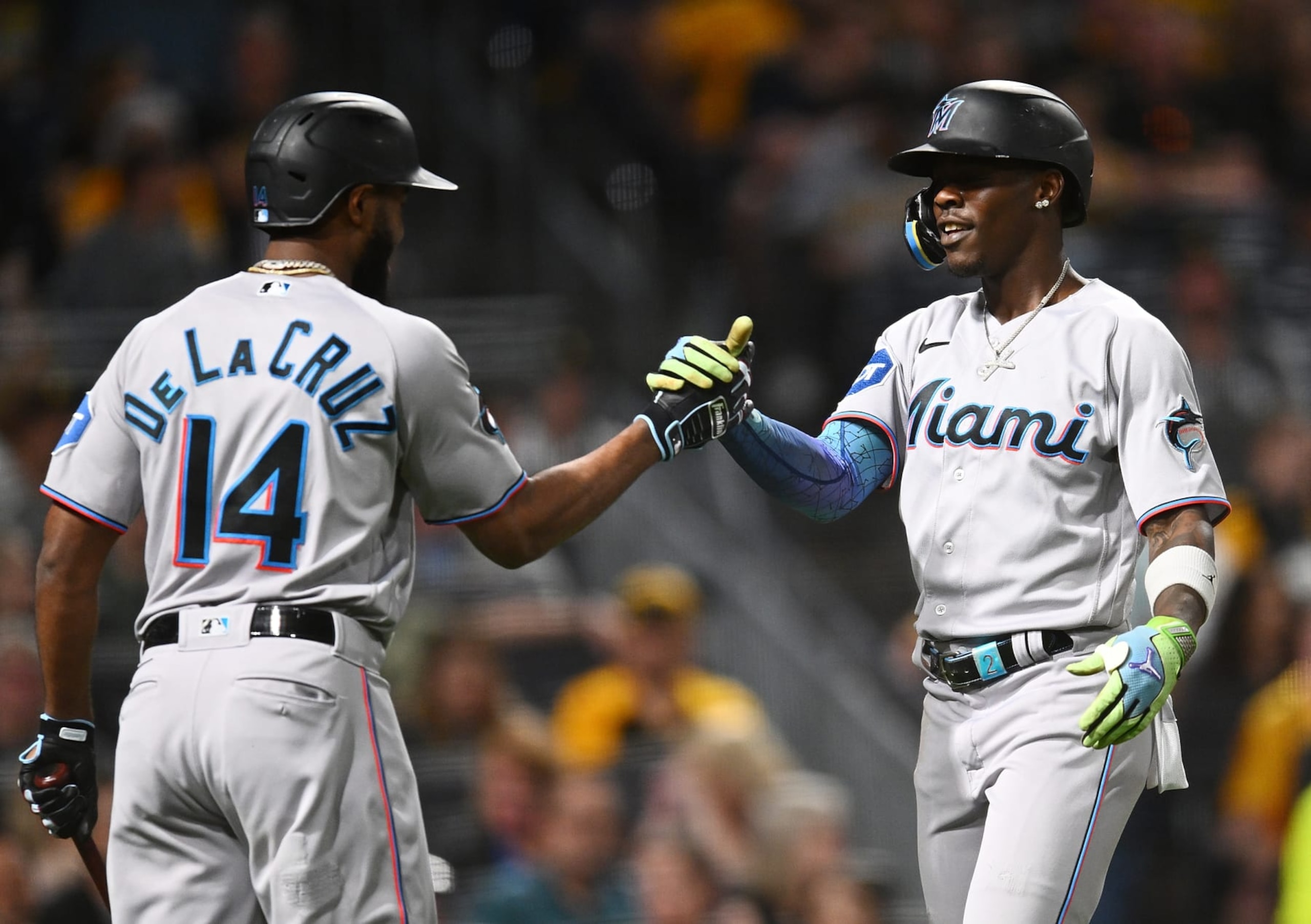 PITTSBURGH, PENNSYLVANIA - SEPTEMBER 30:  Jazz Chisholm Jr. #2 of the Miami Marlins celebrates his solo home run with Bryan De La Cruz #14 during the third inning against the Pittsburgh Pirates at PNC Park on September 30, 2023 in Pittsburgh, Pennsylvania. (Photo by Joe Sargent/Getty Images)