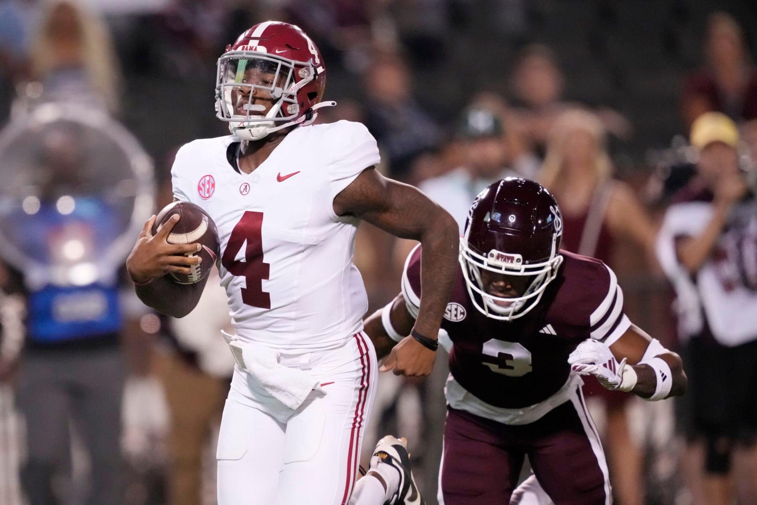 Alabama quarterback Jalen Milroe (4) scrambles for a touchdown run past Mississippi State cornerback Decamerion Richardson (3) during the first half of an NCAA college football game, Saturday, Sept. 30, 2023, in Starkville, Miss. (AP Photo/Rogelio V. Solis) Alabama quarterback Jalen Milroe (4) scrambles for a touchdown run past Mississippi State cornerback Decamerion Richardson (3) during the first half of an NCAA college football game, Saturday, Sept. 30, 2023, in Starkville, Miss. (AP Photo/Rogelio V. Solis)
