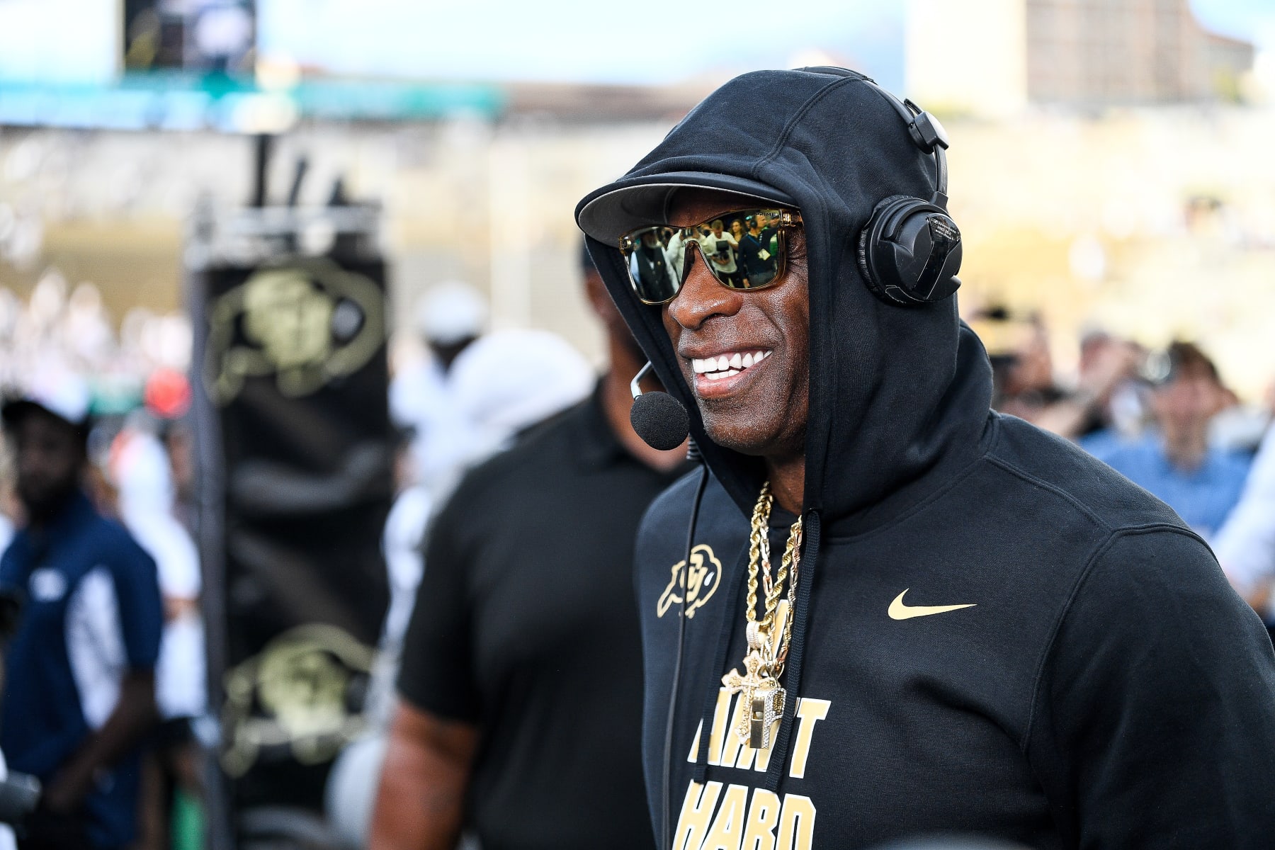 BOULDER, CO - SEPTEMBER 30:  Head coach Deion Sanders of the Colorado Buffaloes gives a pregame interview before a game against the USC Trojans at Folsom Field on September 30, 2023 in Boulder, Colorado. (Photo by Dustin Bradford/Getty Images)