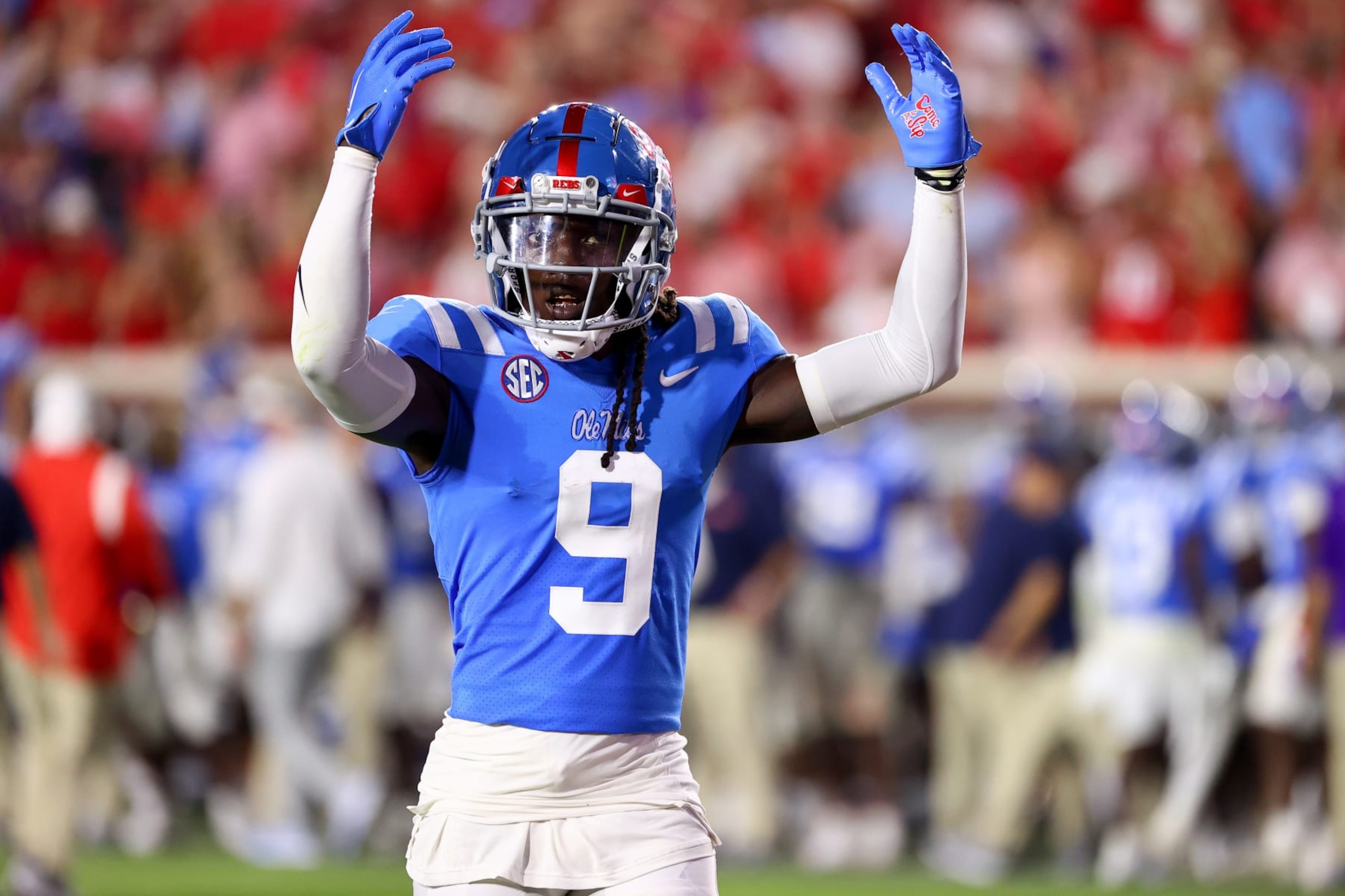 OXFORD, MISSISSIPPI - SEPTEMBER 30: DeShawn Gaddie Jr. #9 of the Mississippi Rebels tries to pump up the crowd against the LSU Tigers at Vaught-Hemingway Stadium on September 30, 2023 in Oxford, Mississippi. (Photo by Jamie Schwaberow/Getty Images)