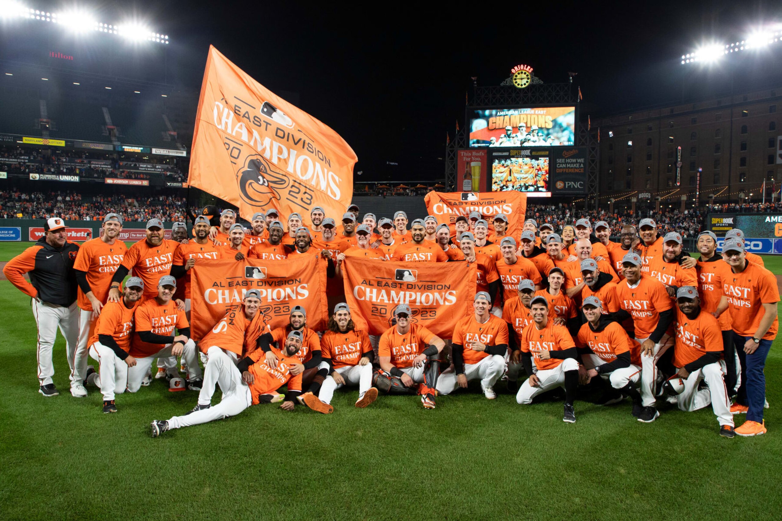 BALTIMORE, MARYLAND - SEPTEMBER 28: Baltimore Orioles players pose for a group photo after defeating the Boston Red Sox to win the American League East at Oriole Park at Camden Yards on September 28, 2023 in Baltimore, Maryland. (Photo by Brandon Sloter/Image Of Sport/Getty Images)