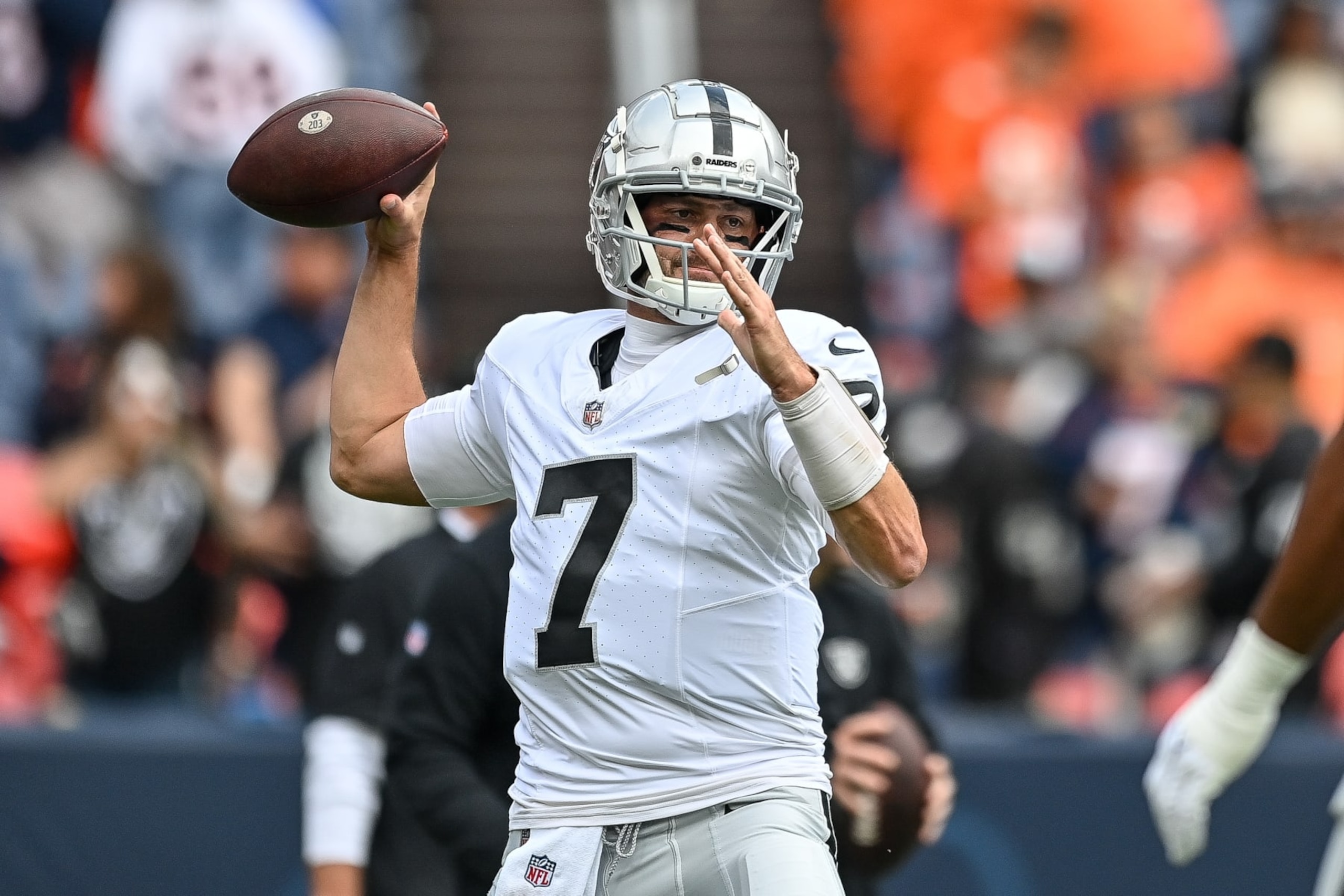 DENVER, COLORADO - SEPTEMBER 10: Aidan O'Connell #4 of the Las Vegas Raiders throws as he warms up before a game against the Denver Broncos at Empower Field at Mile High on September 10, 2023 in Denver, Colorado. (Photo by Dustin Bradford/Getty Images) DENVER, COLORADO - SEPTEMBER 10: Aidan O'Connell #4 of the Las Vegas Raiders throws as he warms up before a game against the Denver Broncos at Empower Field at Mile High on September 10, 2023 in Denver, Colorado. (Photo by Dustin Bradford/Getty Images)