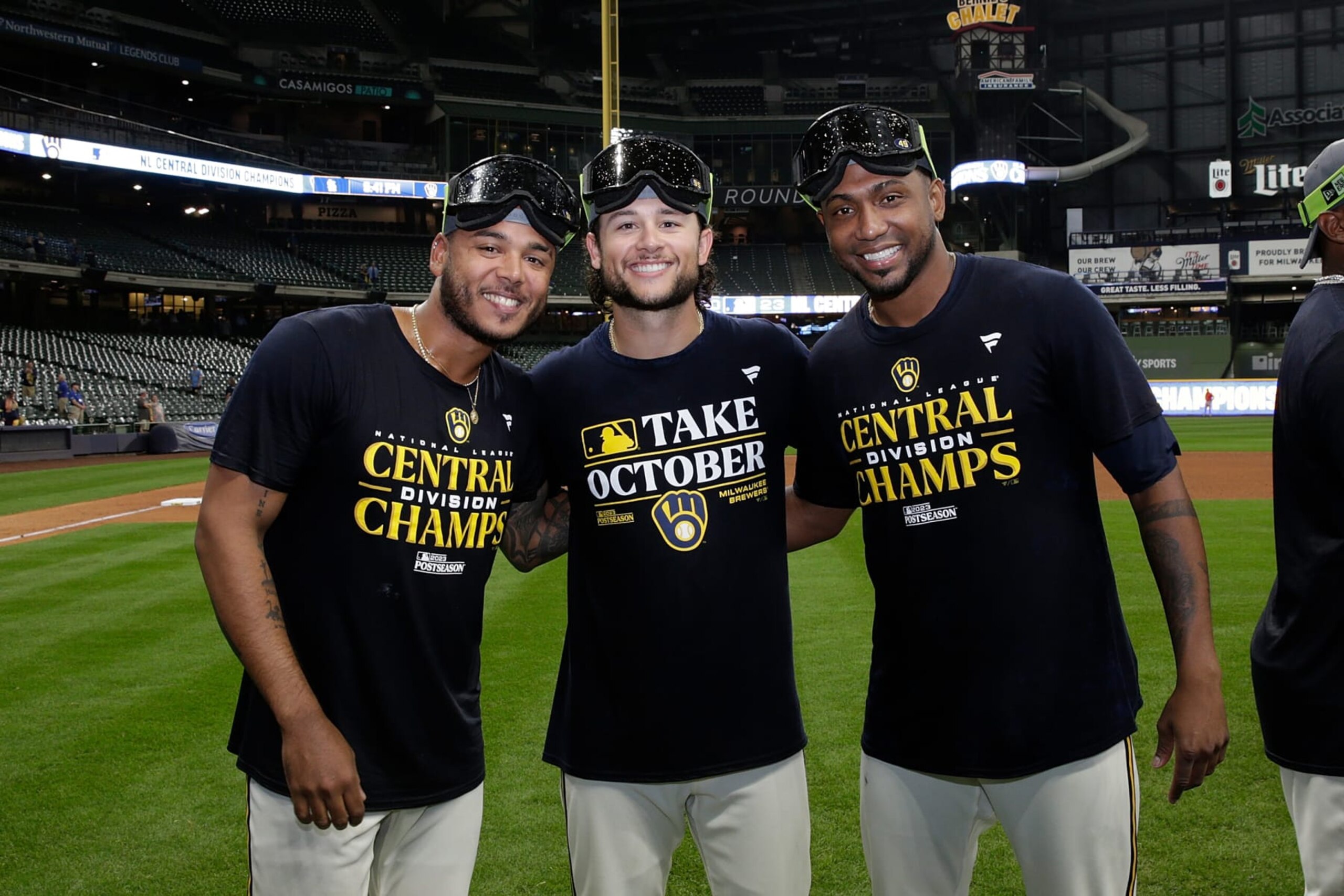 MILWAUKEE, WISCONSIN - SEPTEMBER 26: Milwaukee Brewers players celebrate after winning the National League Central Division at American Family Field on September 26, 2023 in Milwaukee, Wisconsin. (Photo by John Fisher/Getty Images)