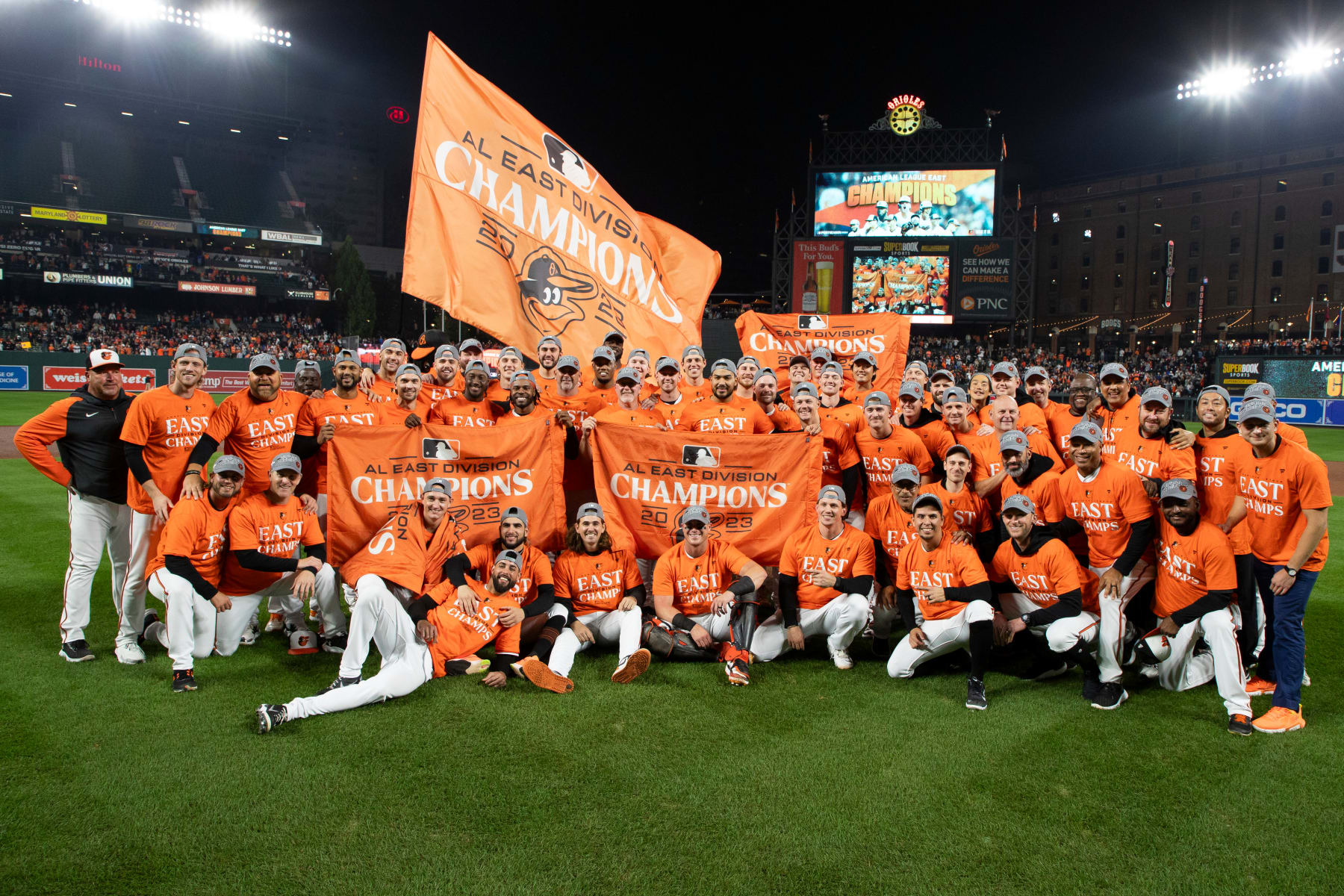 BALTIMORE, MARYLAND - SEPTEMBER 28: Baltimore Orioles players pose for a group photo after defeating the Boston Red Sox to win the American League East at Oriole Park at Camden Yards on September 28, 2023 in Baltimore, Maryland. (Photo by Brandon Sloter/Image Of Sport/Getty Images)