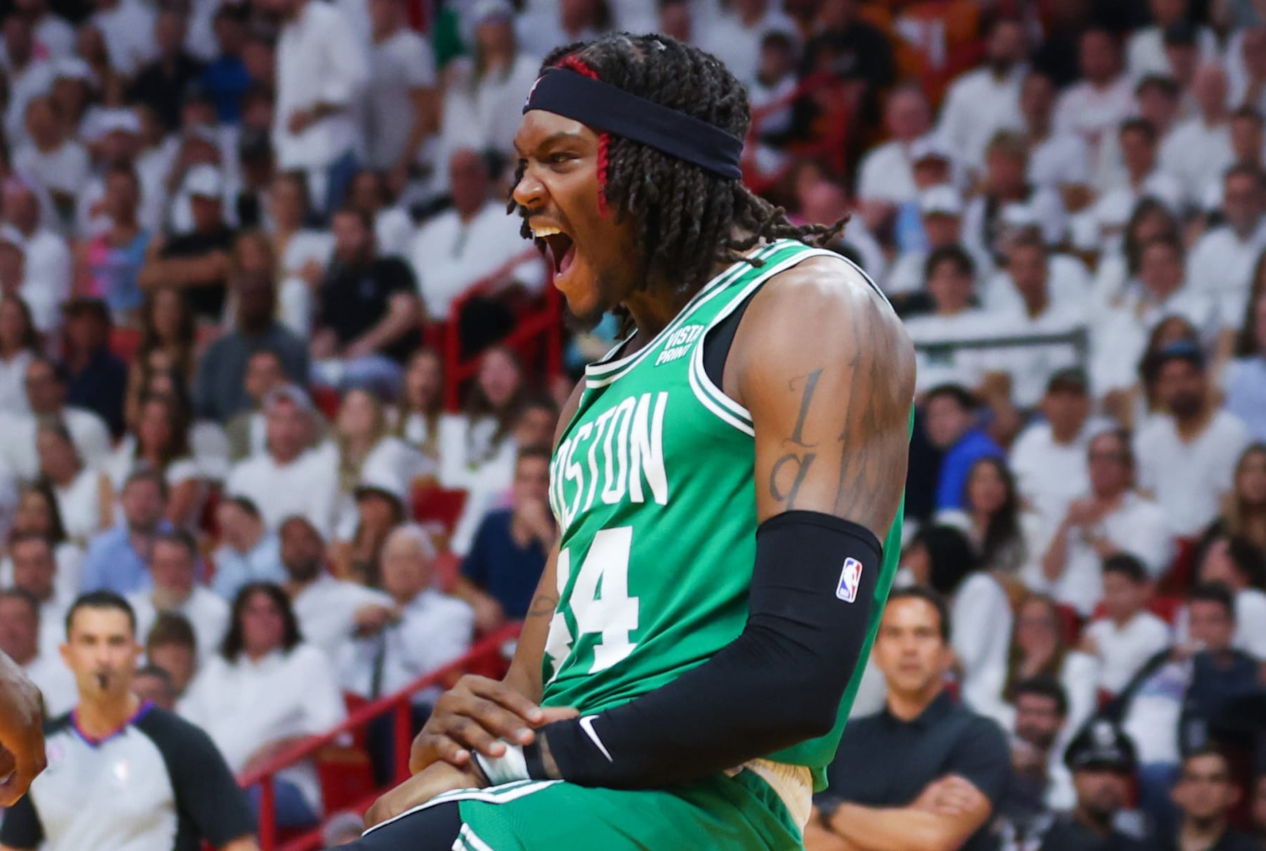 MIAMI, FLORIDA - MAY 27: Robert Williams III #44 of the Boston Celtics reacts to a dunk against the Miami Heat during the second quarter in game six of the Eastern Conference Finals at Kaseya Center on May 27, 2023 in Miami, Florida. NOTE TO USER: User expressly acknowledges and agrees that, by downloading and or using this photograph, User is consenting to the terms and conditions of the Getty Images License Agreement. (Photo by Mike Ehrmann/Getty Images)