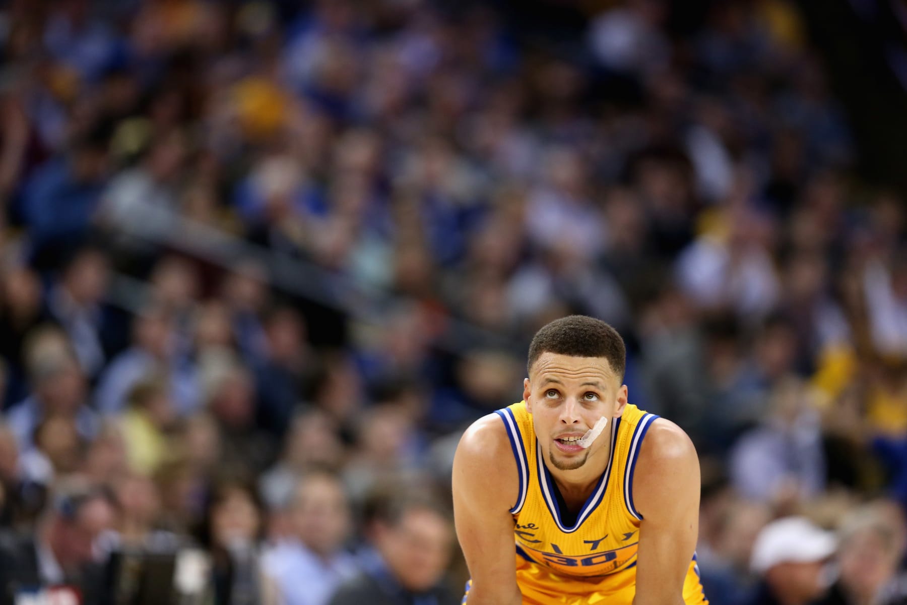 OAKLAND, CA - MARCH 29:  Stephen Curry #30 of the Golden State Warriors stands on the court during their game against the Washington Wizards at ORACLE Arena on March 29, 2016 in Oakland, California. NOTE TO USER: User expressly acknowledges and agrees that, by downloading and or using this photograph, User is consenting to the terms and conditions of the Getty Images License Agreement.  (Photo by Ezra Shaw/Getty Images)