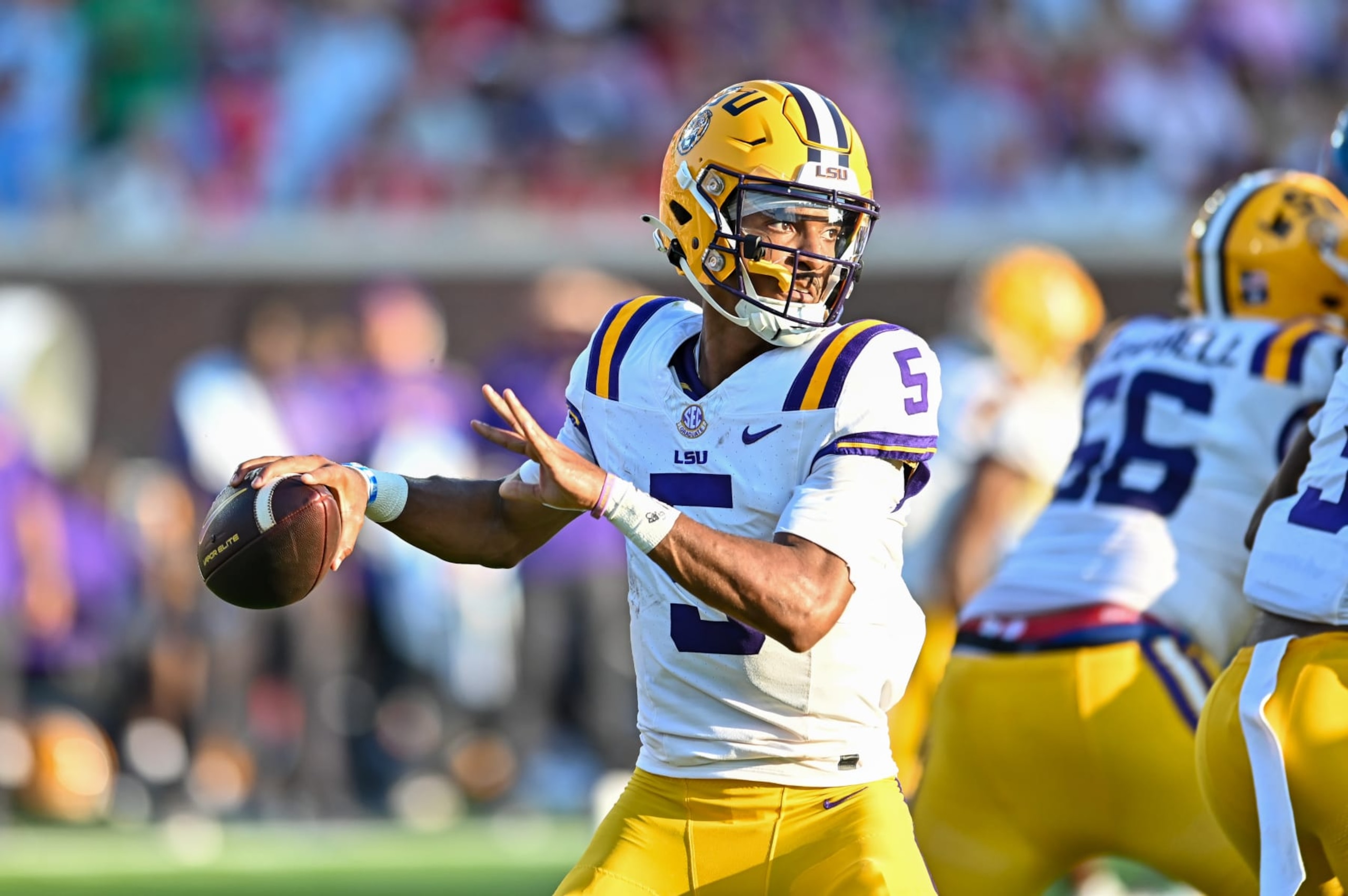 OXFORD, MS - SEPTEMBER 30: LSU quarterback Jayden Daniels (5) in action during the college football game between the LSU Tigers and the Ole' Miss Rebels on September 30, 2023 at Vaught-Hemingway Stadium in Oxford, MS. (Photo by Kevin Langley/Icon Sportswire via Getty Images)
